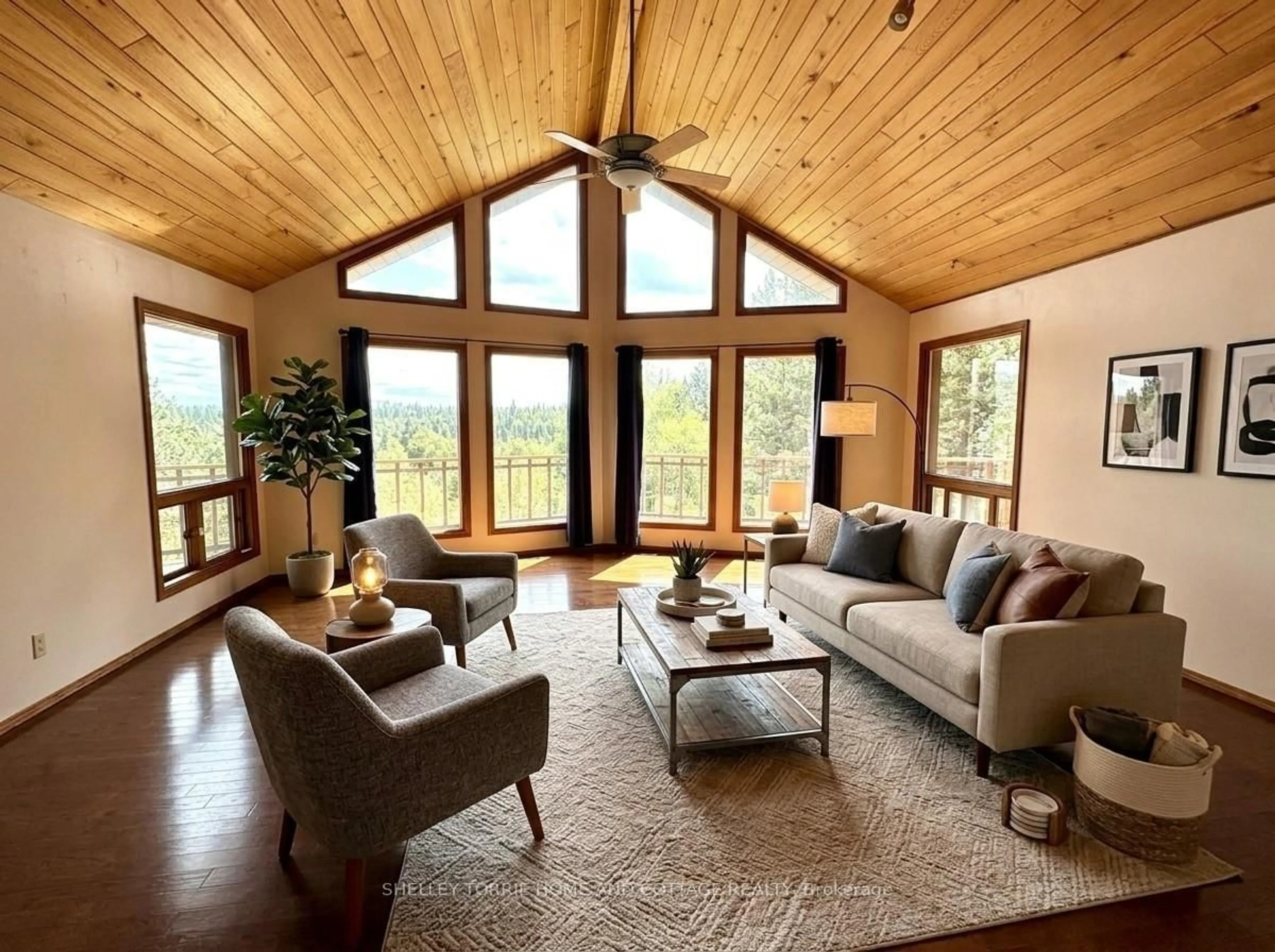 Living room with furniture, wood/laminate floor for 59 Donbrock Dr, Kenora Ontario P9N 0A2