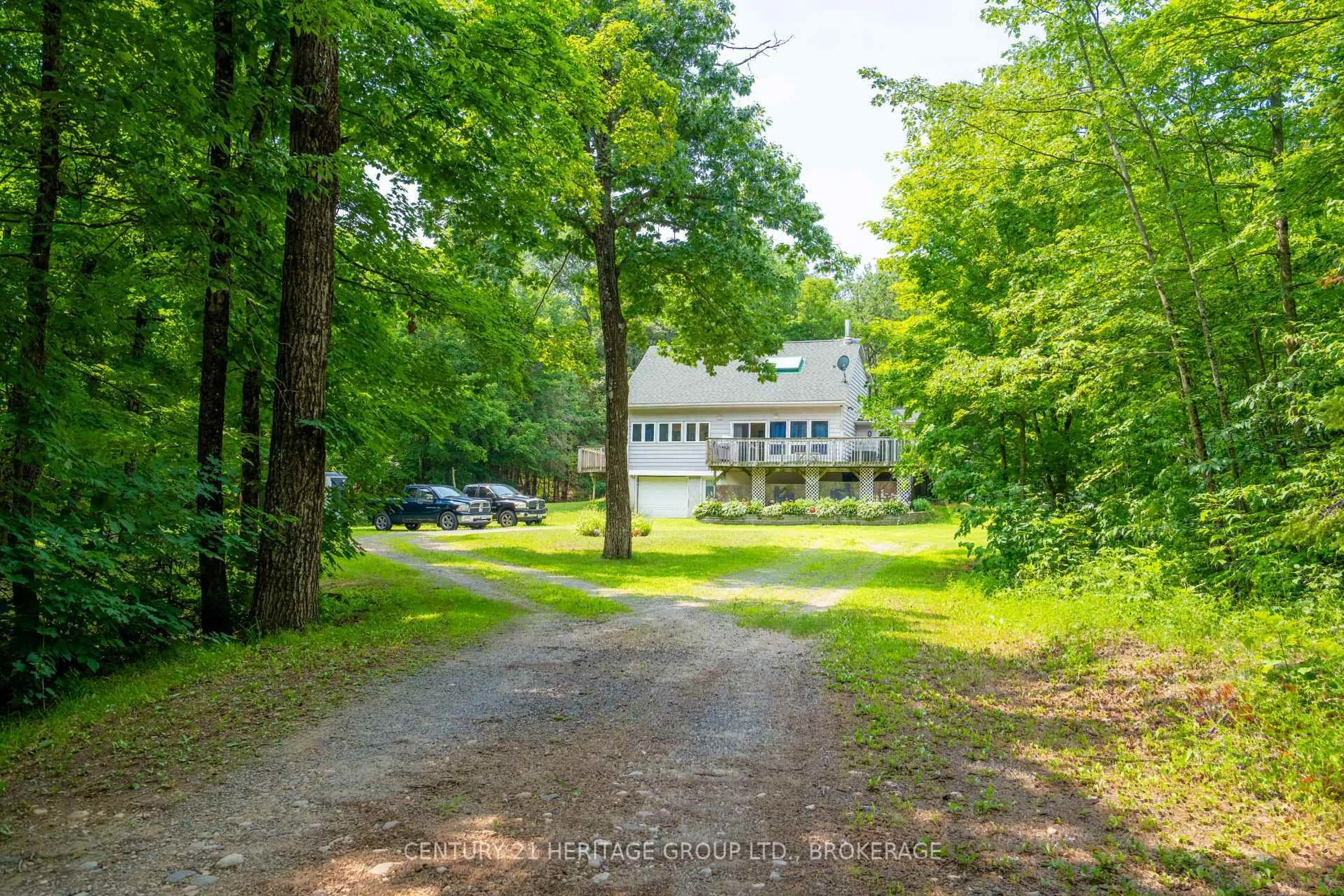 A pic from outside/outdoor area/front of a property/back of a property/a pic from drone, forest/trees view for 15 Maple View Crt, Cloyne Ontario K0H 1K0