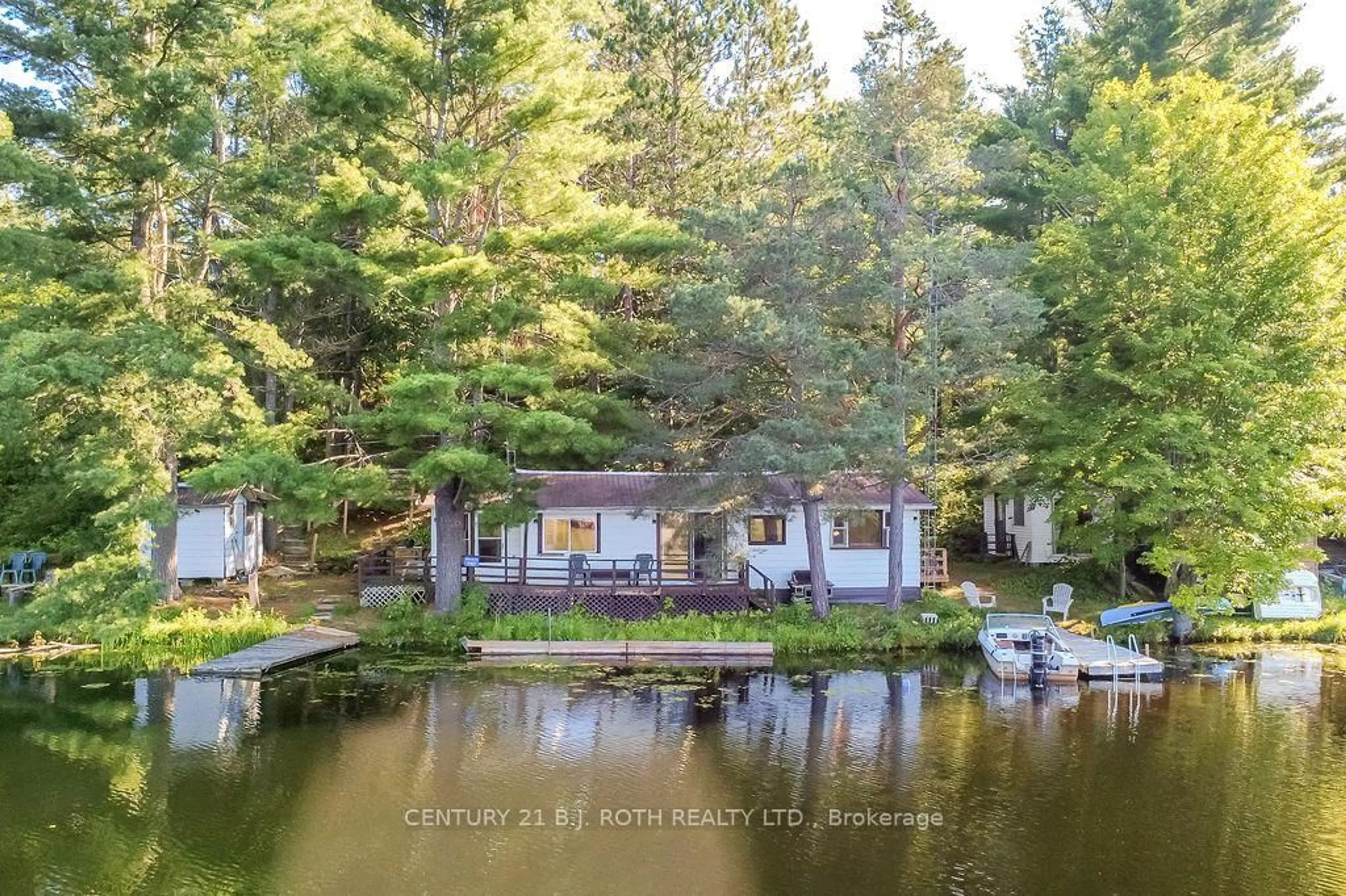 A pic from outside/outdoor area/front of a property/back of a property/a pic from drone, water/lake/river/ocean view for 11107 DEVILS LAKE Rd, Minden Hills Ontario K0M 2K0