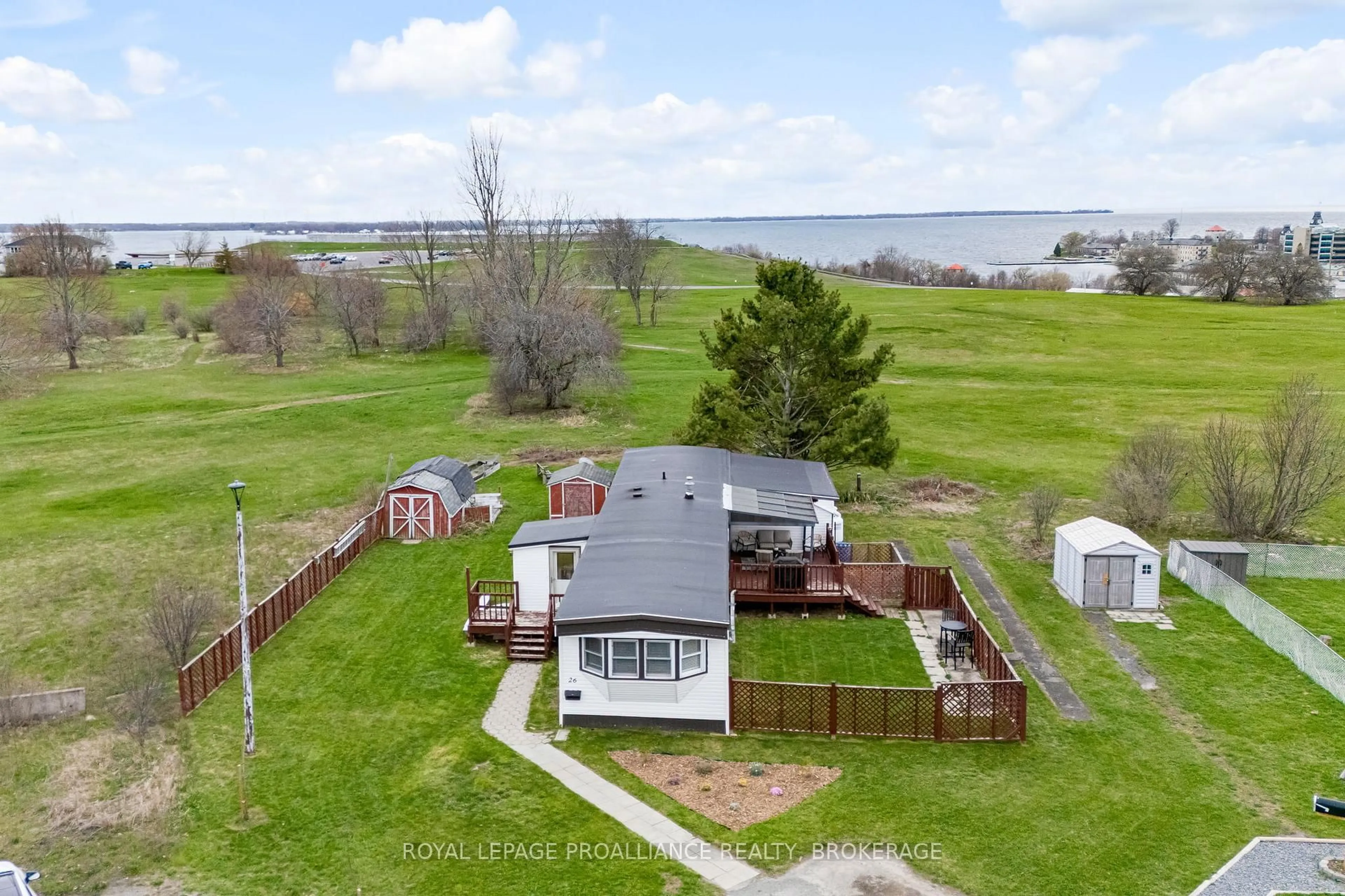 A pic from outside/outdoor area/front of a property/back of a property/a pic from drone, water/lake/river/ocean view for 26 Kapyong Cres, Kingston Ontario K7K 5T5