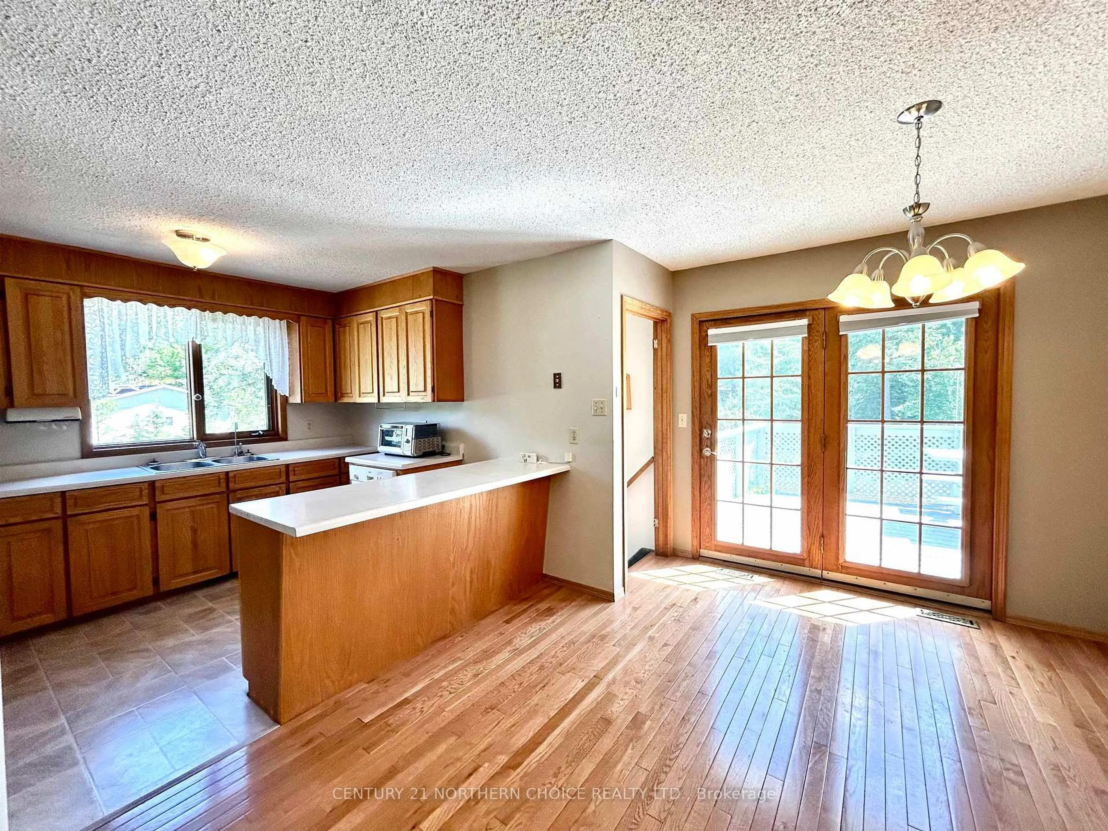 Open concept kitchen, wood/laminate floor for 956 Highway 611S, Alberton Ontario P9A 3M2