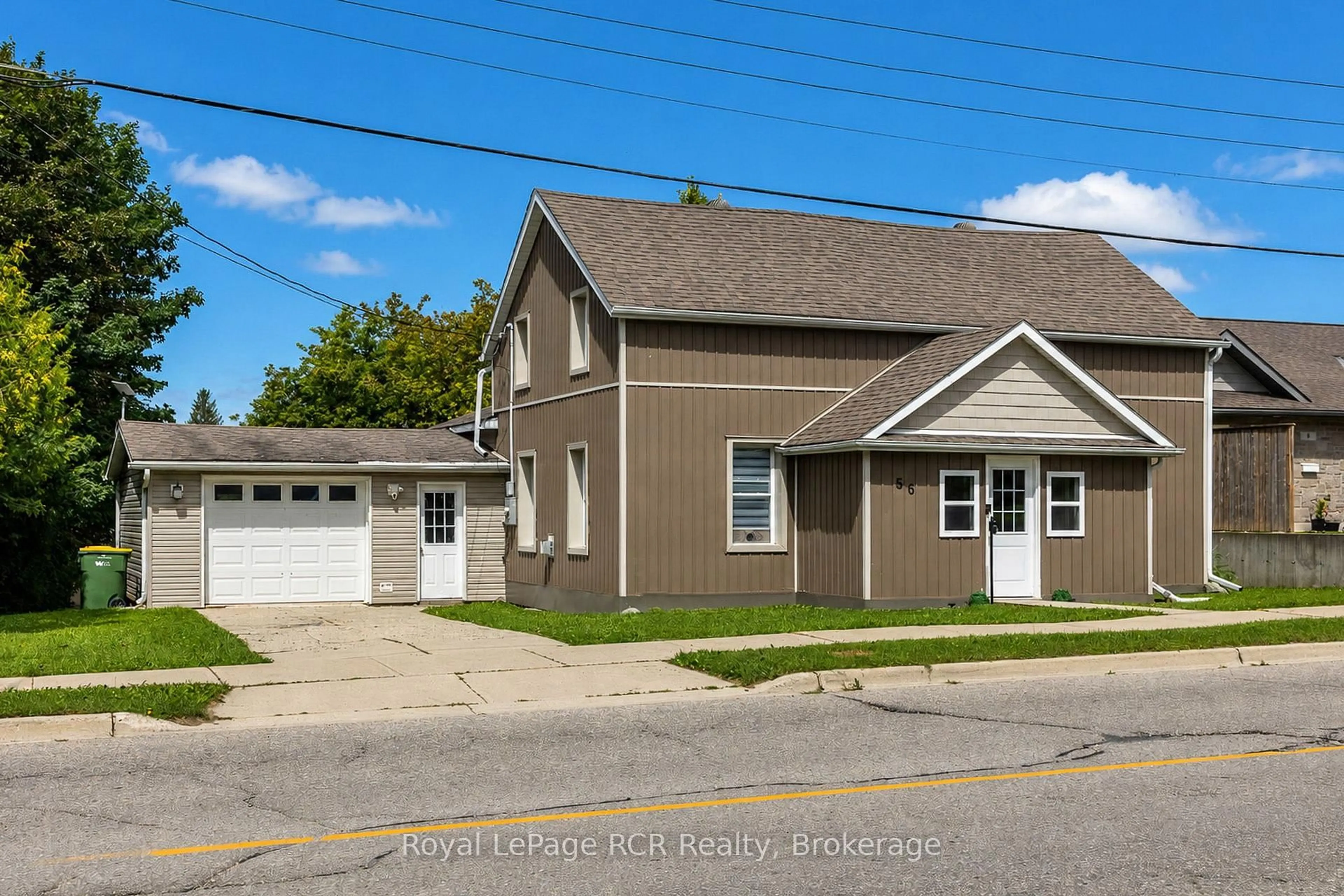 Home with vinyl exterior material, street for 56 Main St, Grey Highlands Ontario N0C 1H0