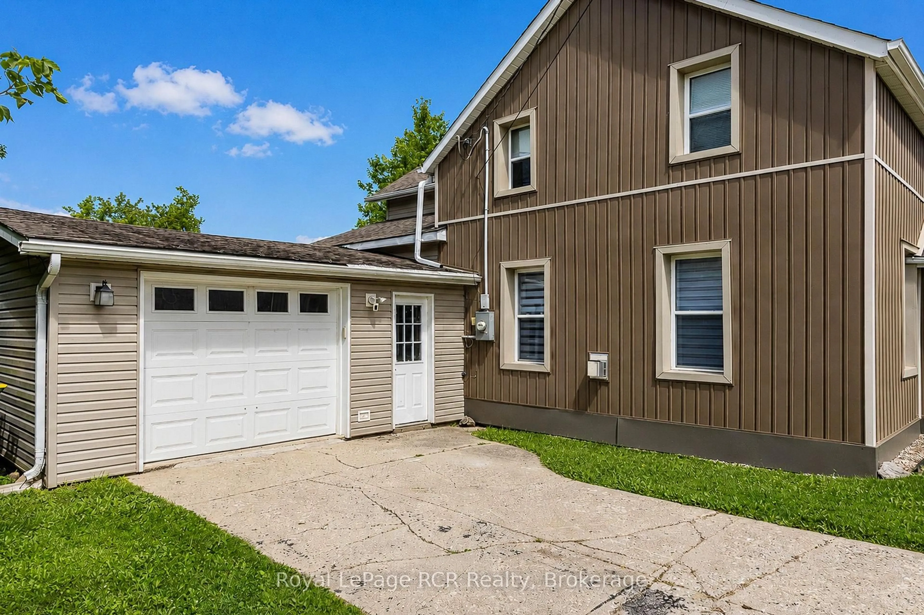 Home with vinyl exterior material, street for 56 Main St, Grey Highlands Ontario N0C 1H0