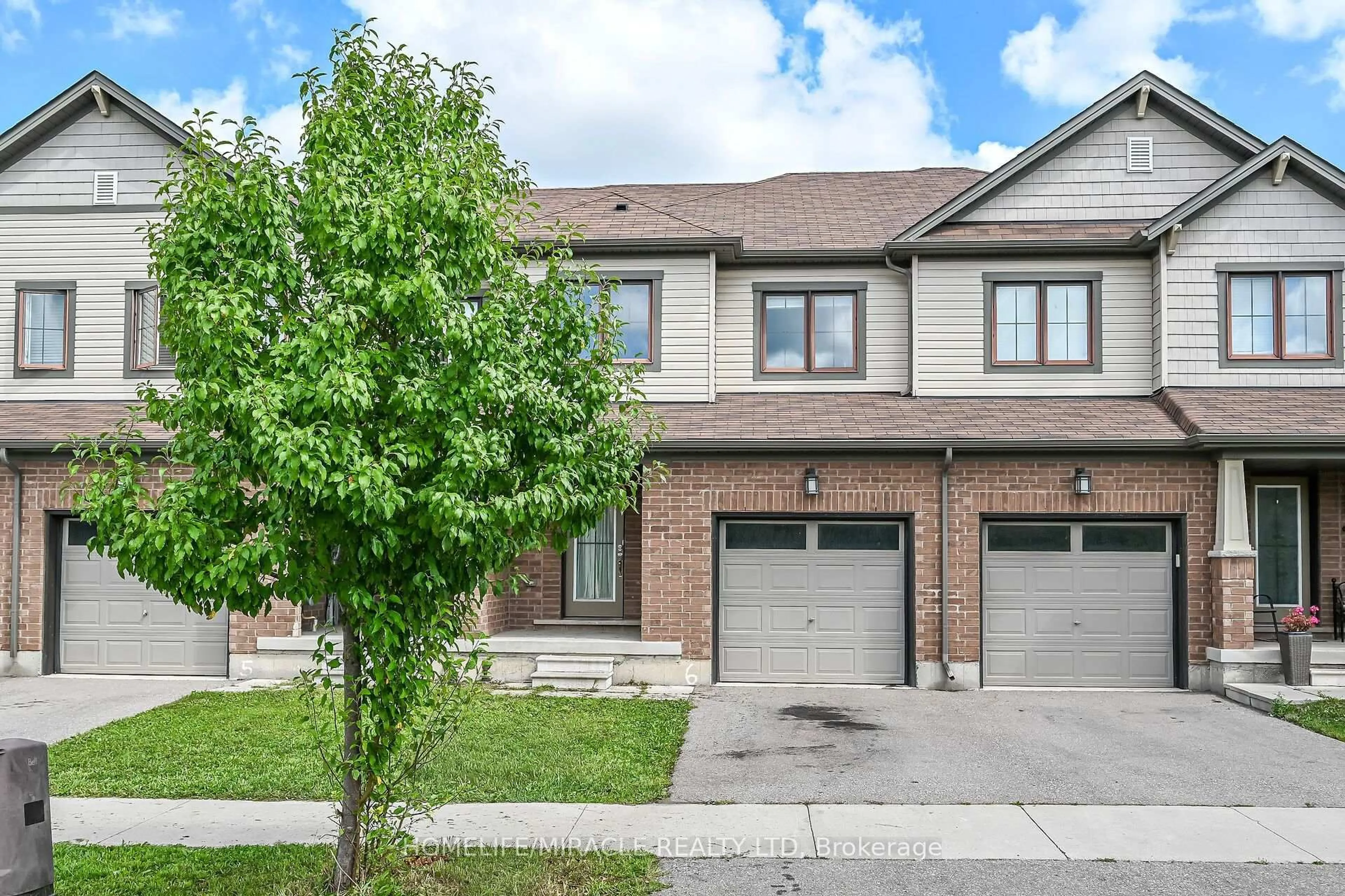 Home with brick exterior material, street for 82 Scarletwood St, Hamilton Ontario L8J 0K8