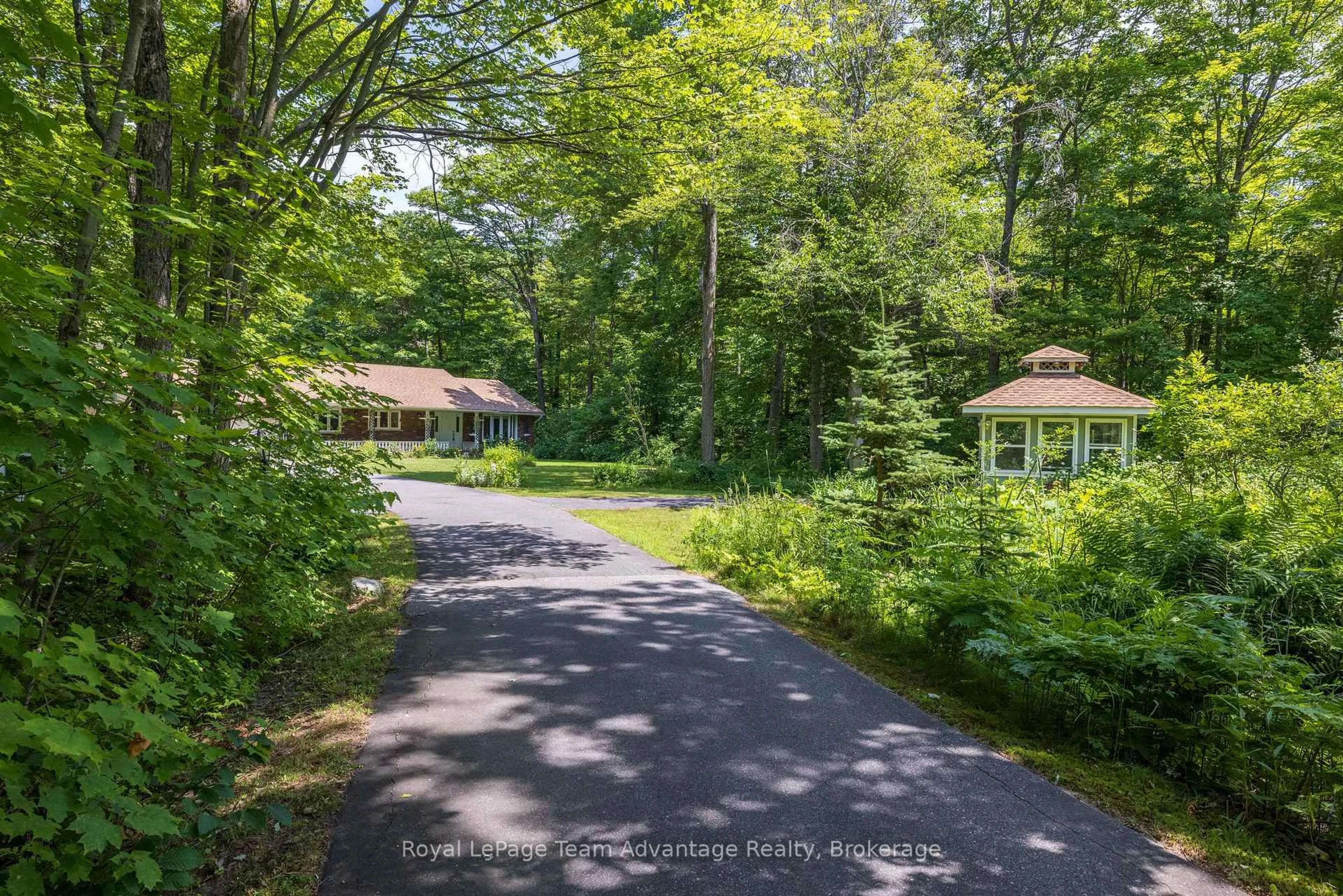 A pic from outside/outdoor area/front of a property/back of a property/a pic from drone, forest/trees view for 120 Rankin Lake Rd, Seguin Ontario P2A 0B2