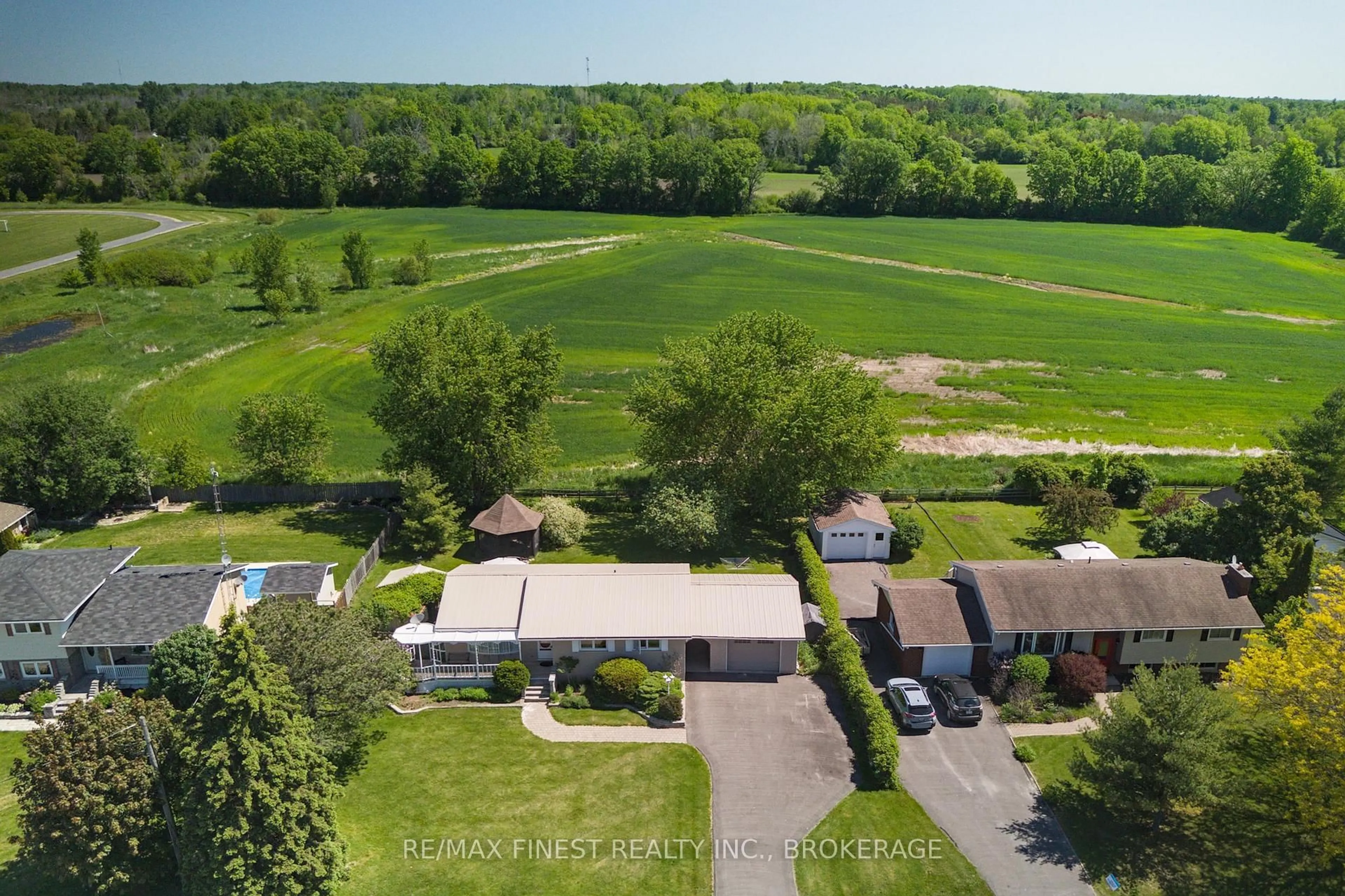 A pic from outside/outdoor area/front of a property/back of a property/a pic from drone, unknown for 301 County Rd 8, Napanee Ontario K7R 3K6