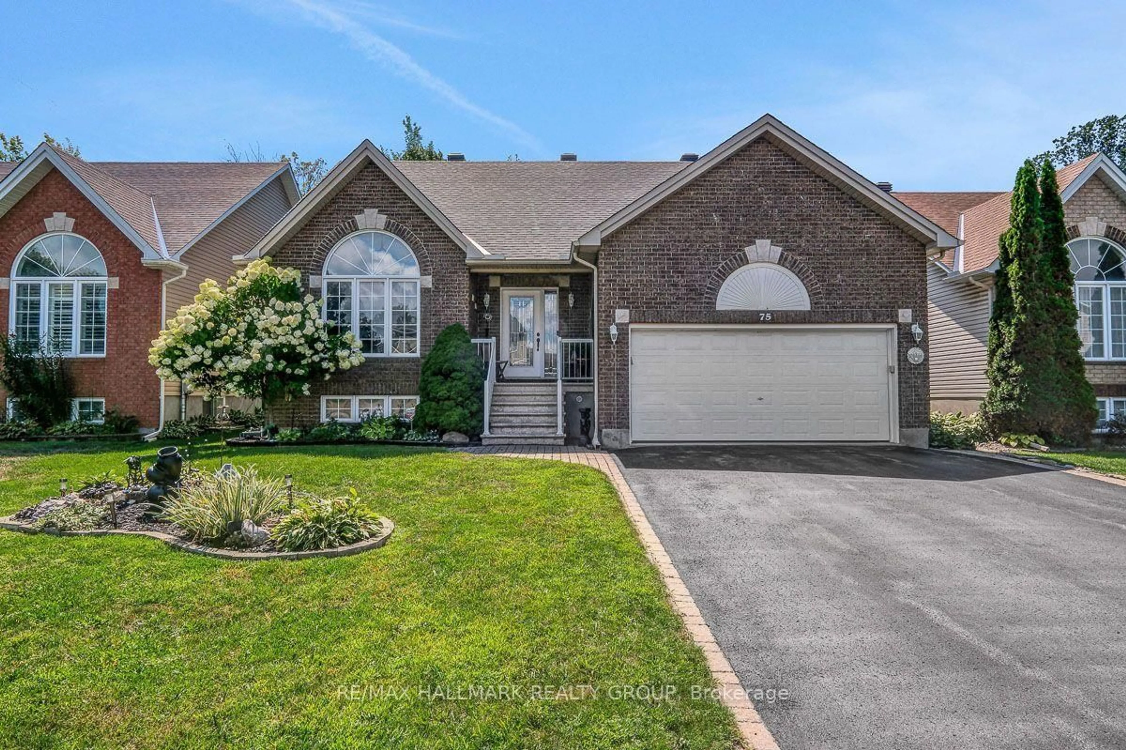 Home with brick exterior material, street for 75 Lloydalex Cres, Ottawa Ontario K2S 2E8