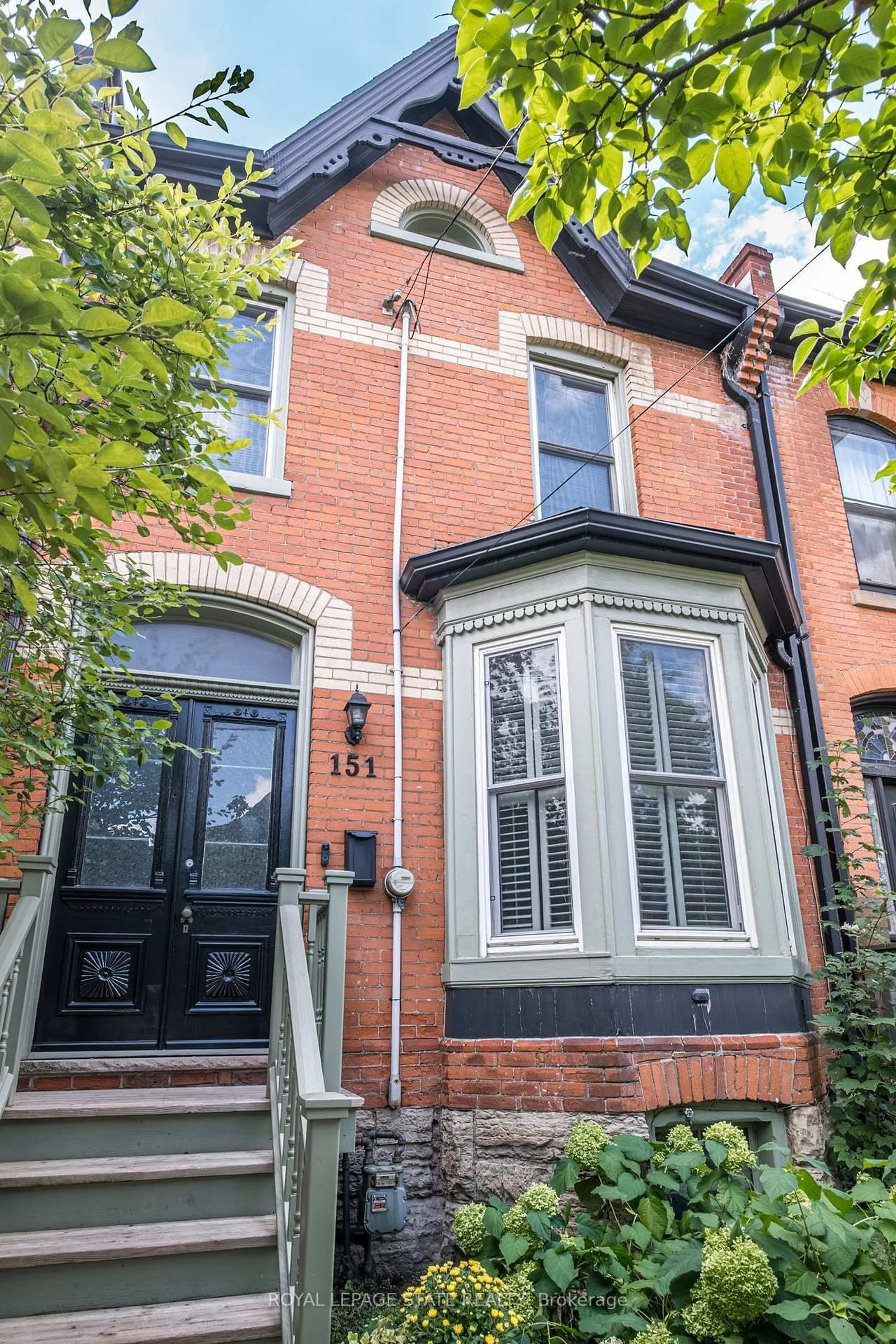 Home with brick exterior material, street for 151 Markland St, Hamilton Ontario L8P 2K4
