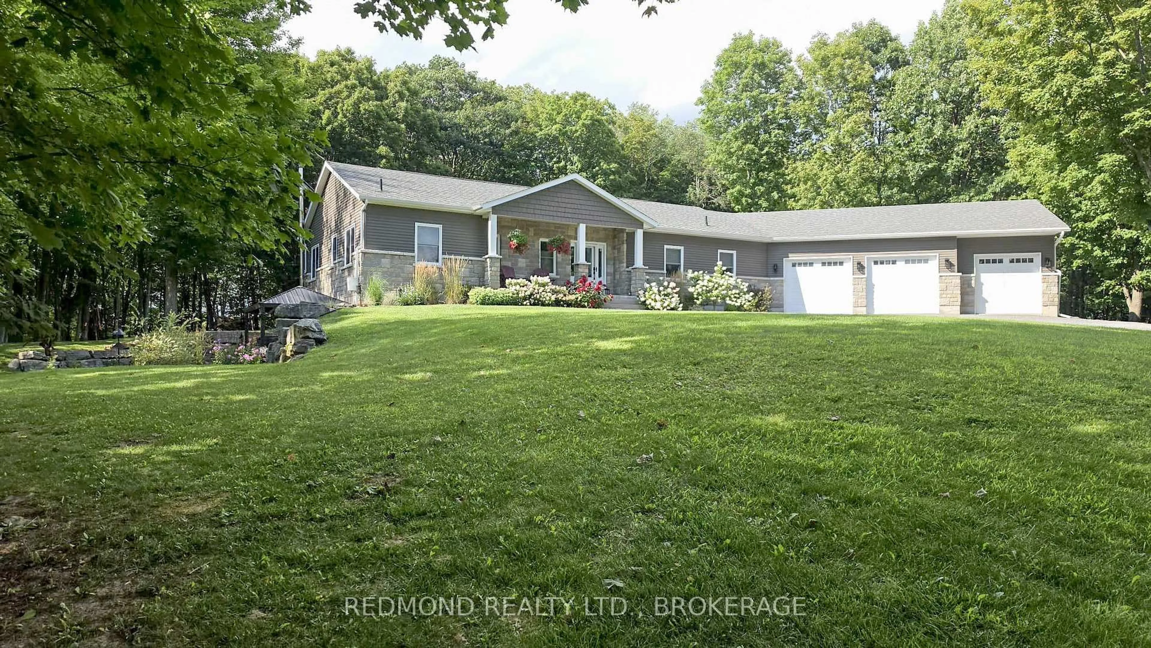 A pic from outside/outdoor area/front of a property/back of a property/a pic from drone, unknown for 430 County Road # 2 Rd, Front of Leeds & Seeleys Bay Ontario K7G 2V4