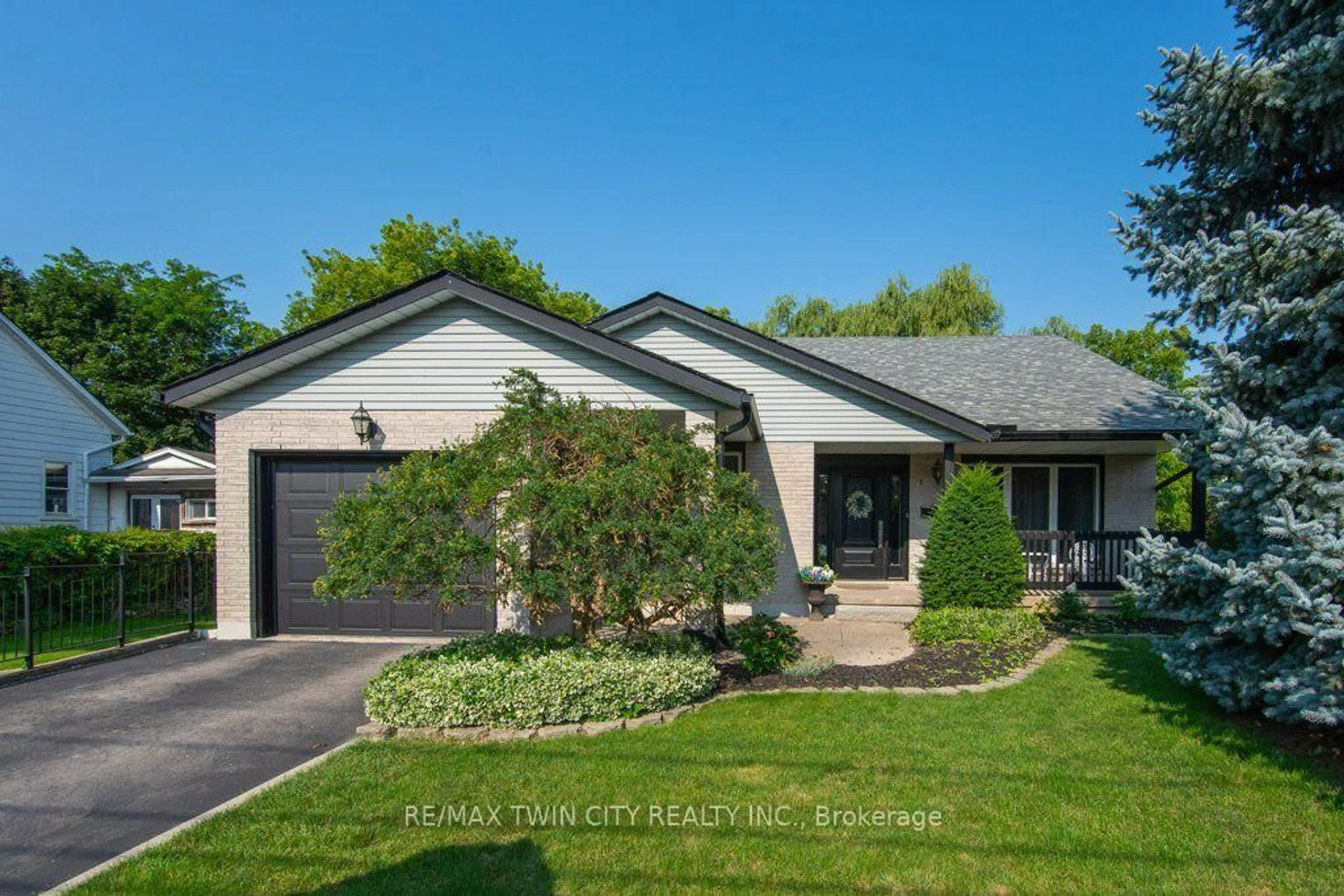 Home with brick exterior material, street for 108 Queensway Dr, Woolwich Ontario N3B 2T5