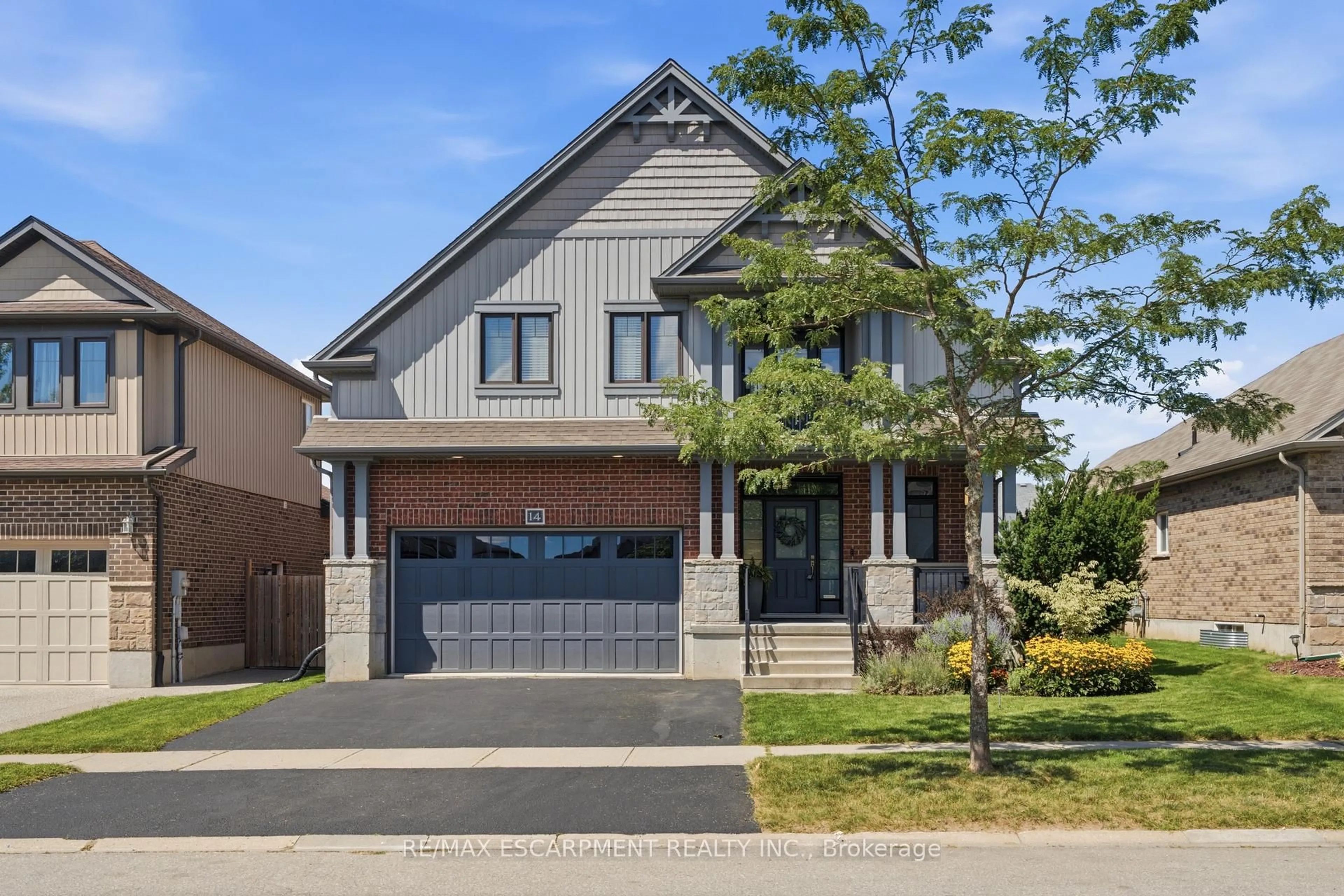 Home with brick exterior material, street for 14 Mcqueen Dr, Brant Ontario N3L 0A3