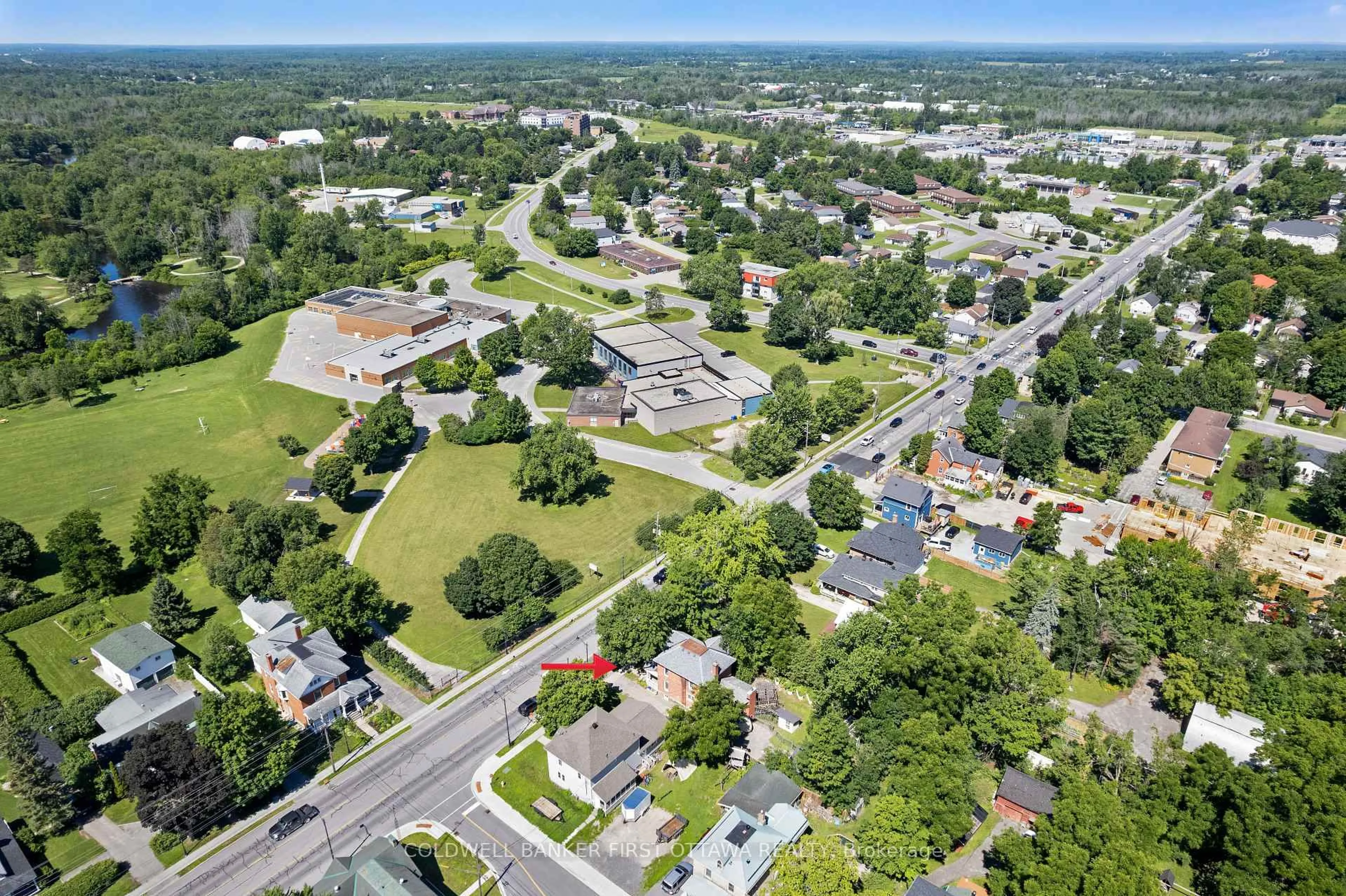 A pic from outside/outdoor area/front of a property/back of a property/a pic from drone, street for 69 Wilson St, Perth Ontario K7H 2N7