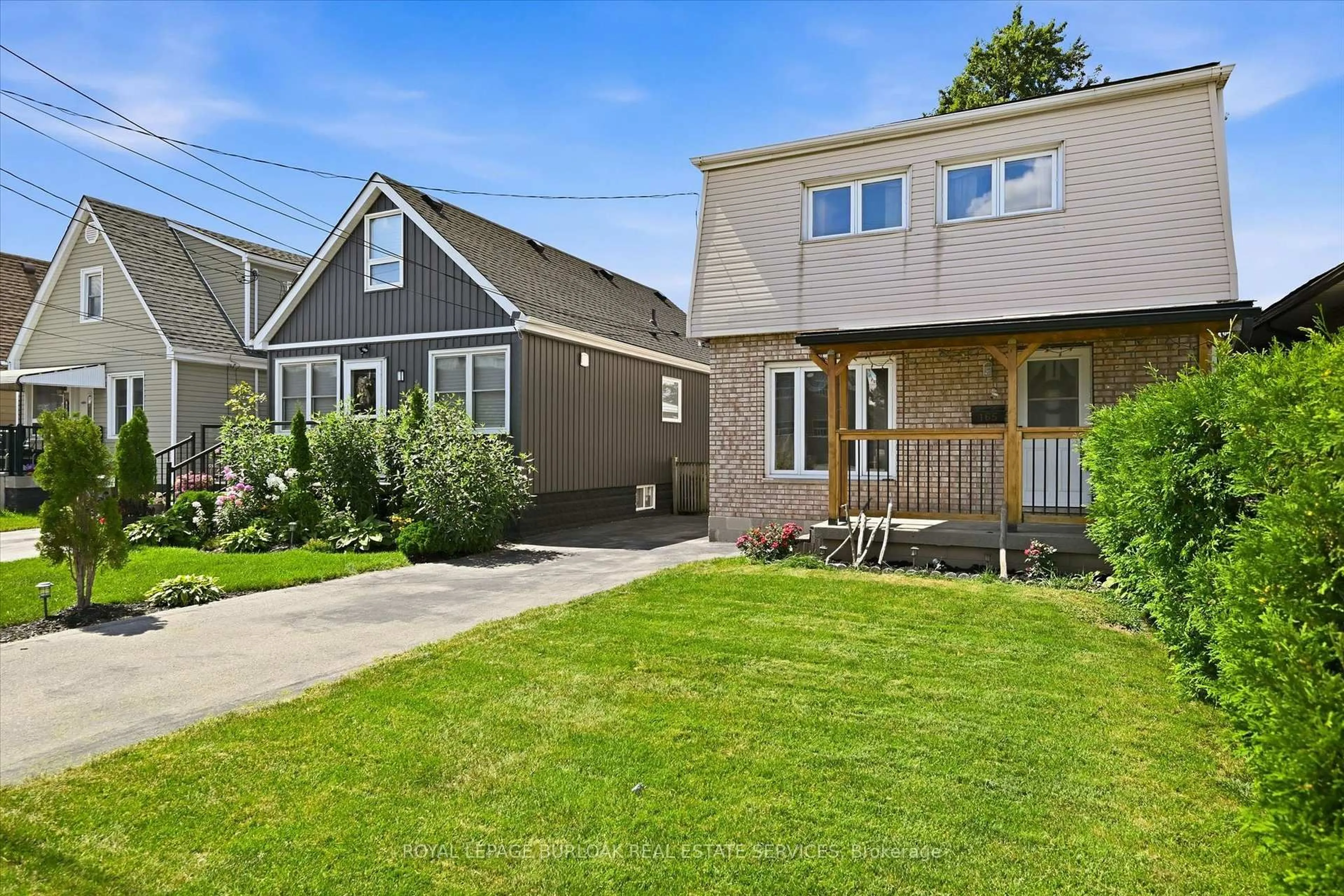 Home with vinyl exterior material, street for 165 Glennie Ave, Hamilton Ontario L8H 5W1