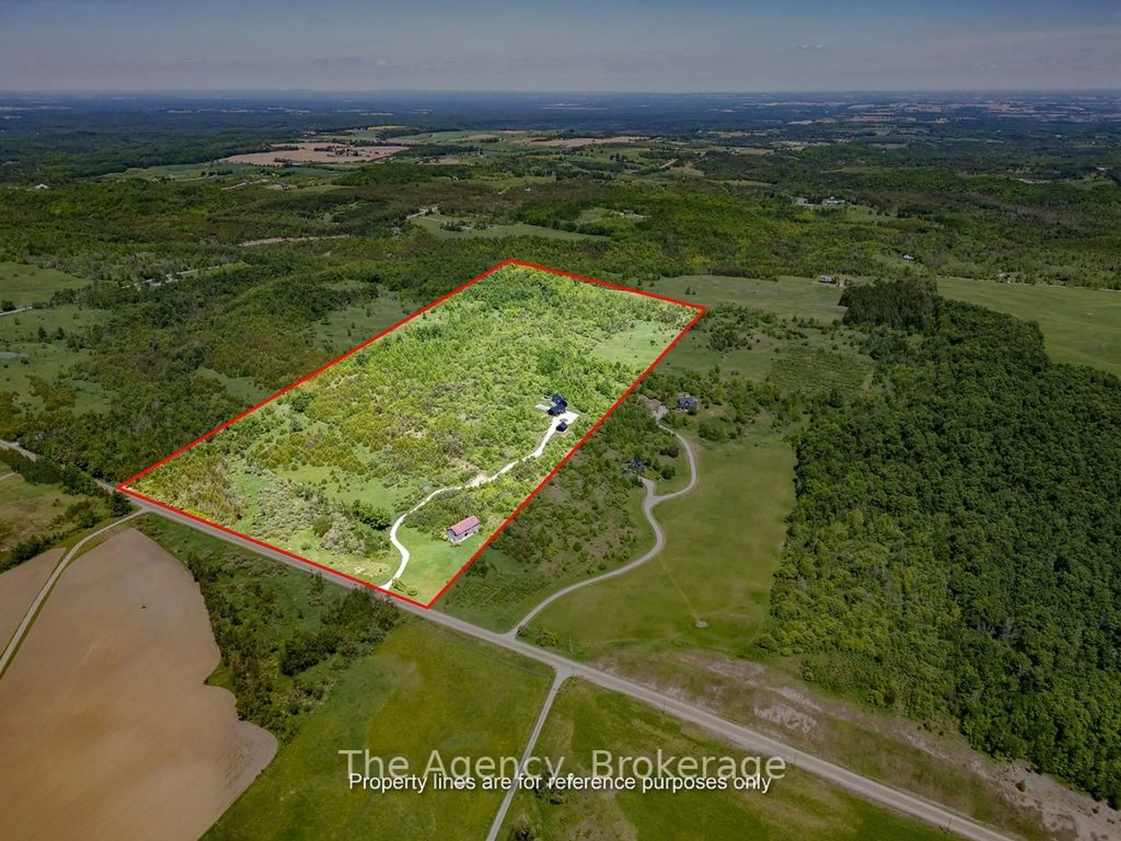 A pic from outside/outdoor area/front of a property/back of a property/a pic from drone, water/lake/river/ocean view for 716555 1st Line, Mulmur Ontario L0N 1J0