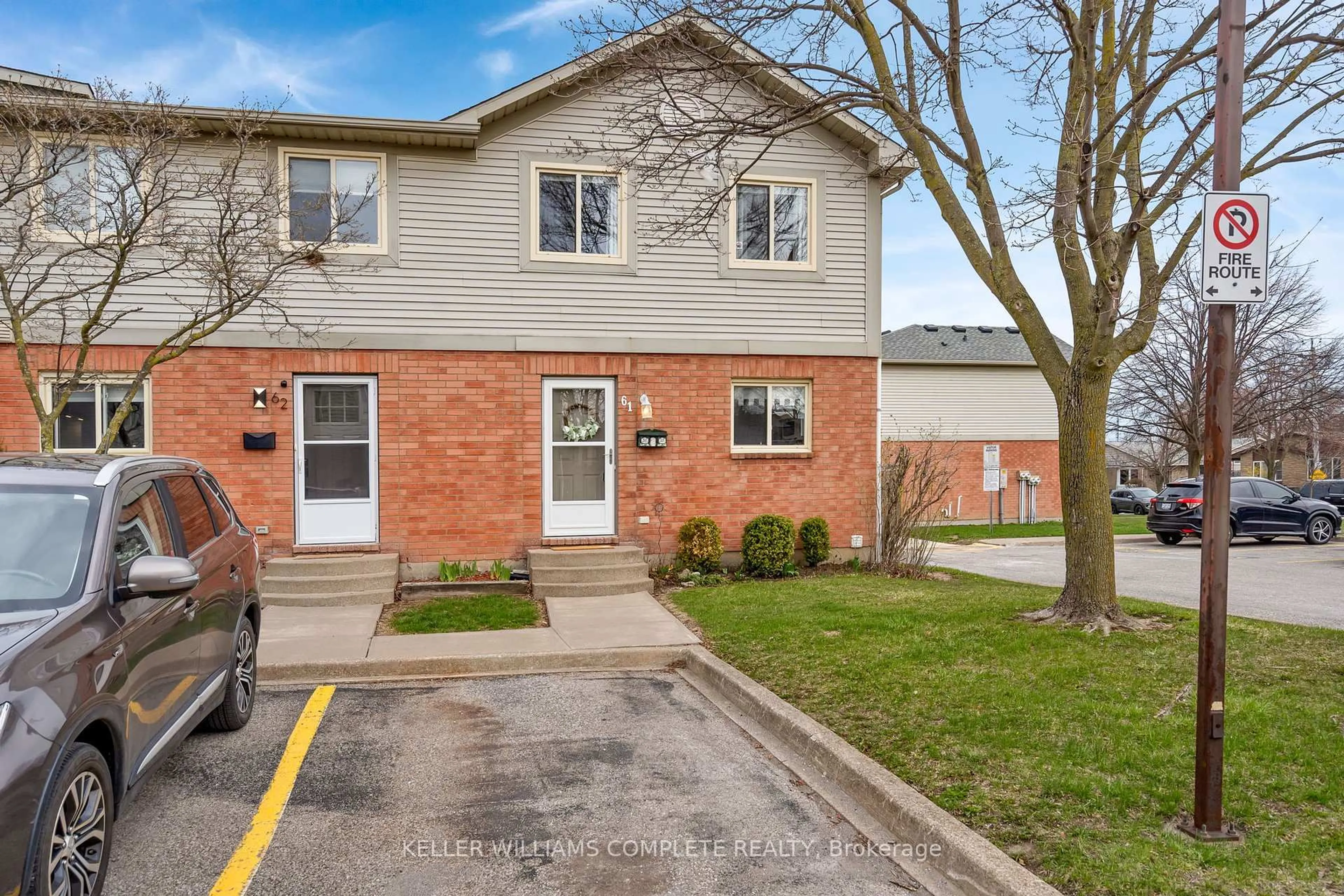 Home with brick exterior material, street for 65 Dorchester Blvd #61, St. Catharines Ontario L2M 7T1