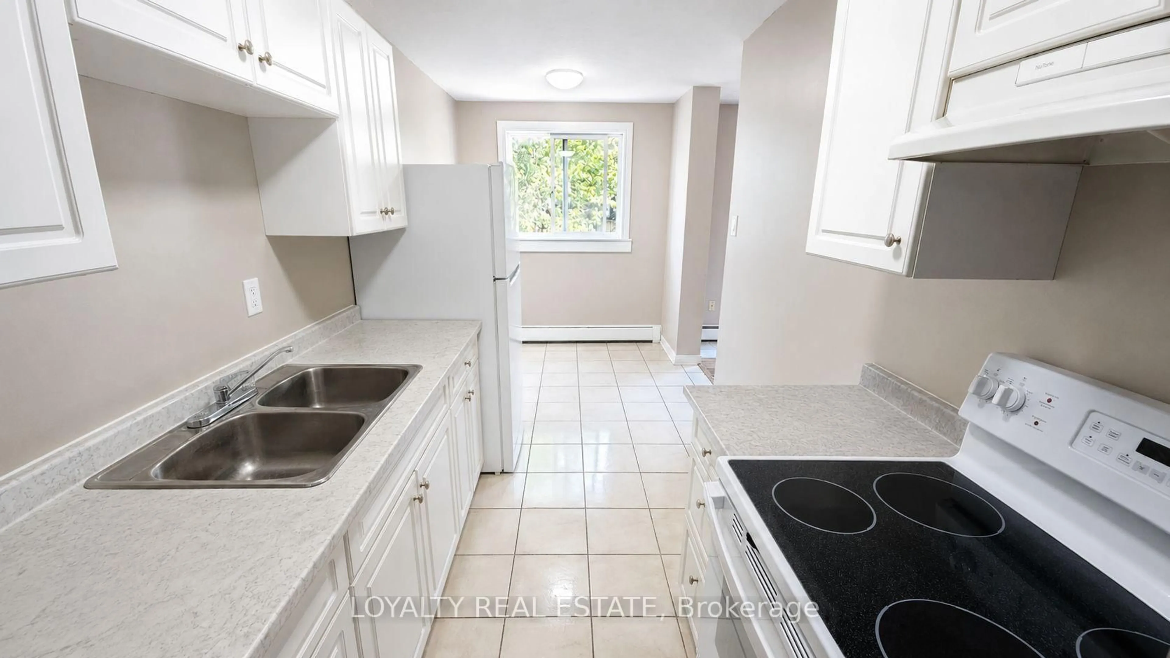 Standard kitchen, ceramic/tile floor for 601 Barber Ave #306, North Perth Ontario N4W 1S4