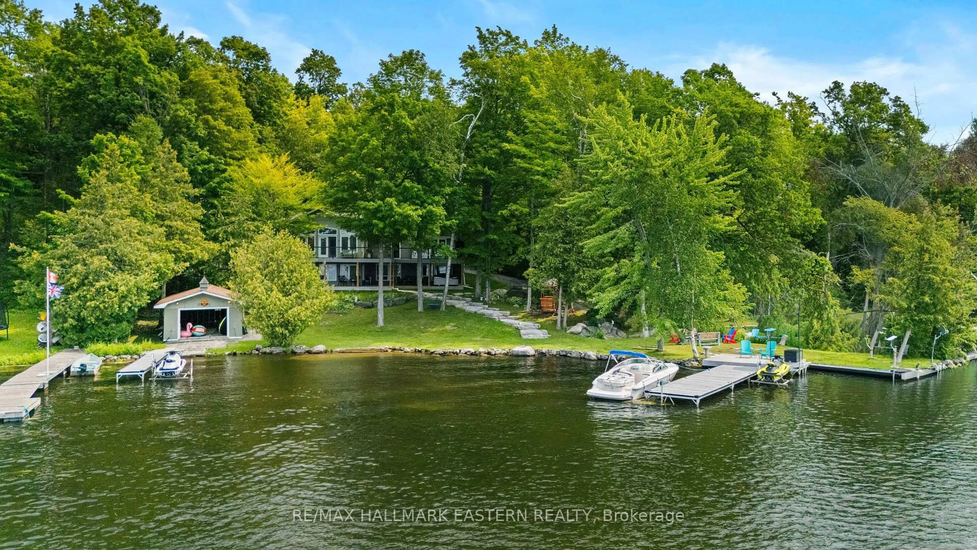A pic from outside/outdoor area/front of a property/back of a property/a pic from drone, water/lake/river/ocean view for 28 Maplewood Crt, Trent Lakes Ontario K9J 6X2