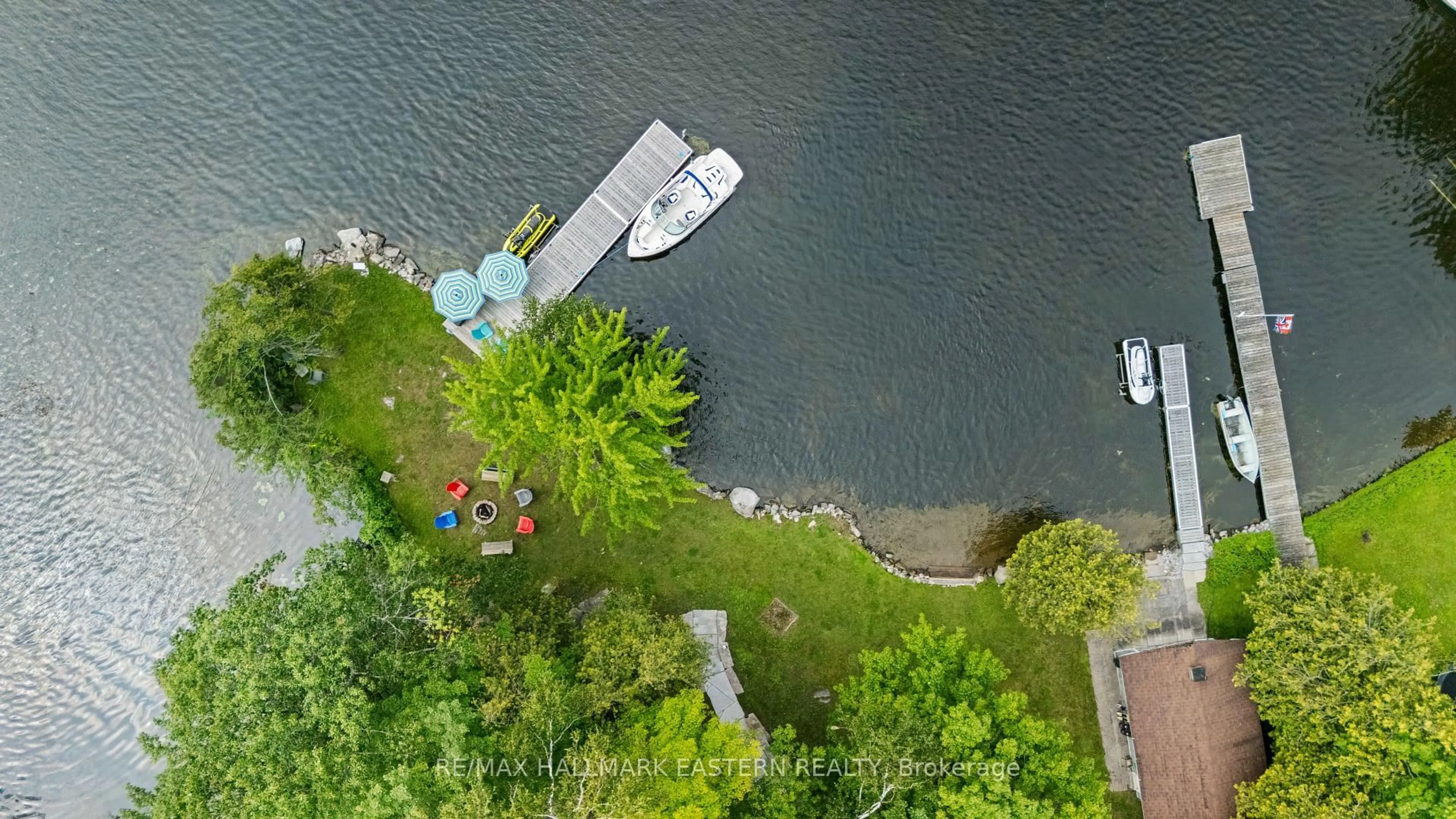 A pic from outside/outdoor area/front of a property/back of a property/a pic from drone, water/lake/river/ocean view for 28 Maplewood Crt, Trent Lakes Ontario K9J 6X2
