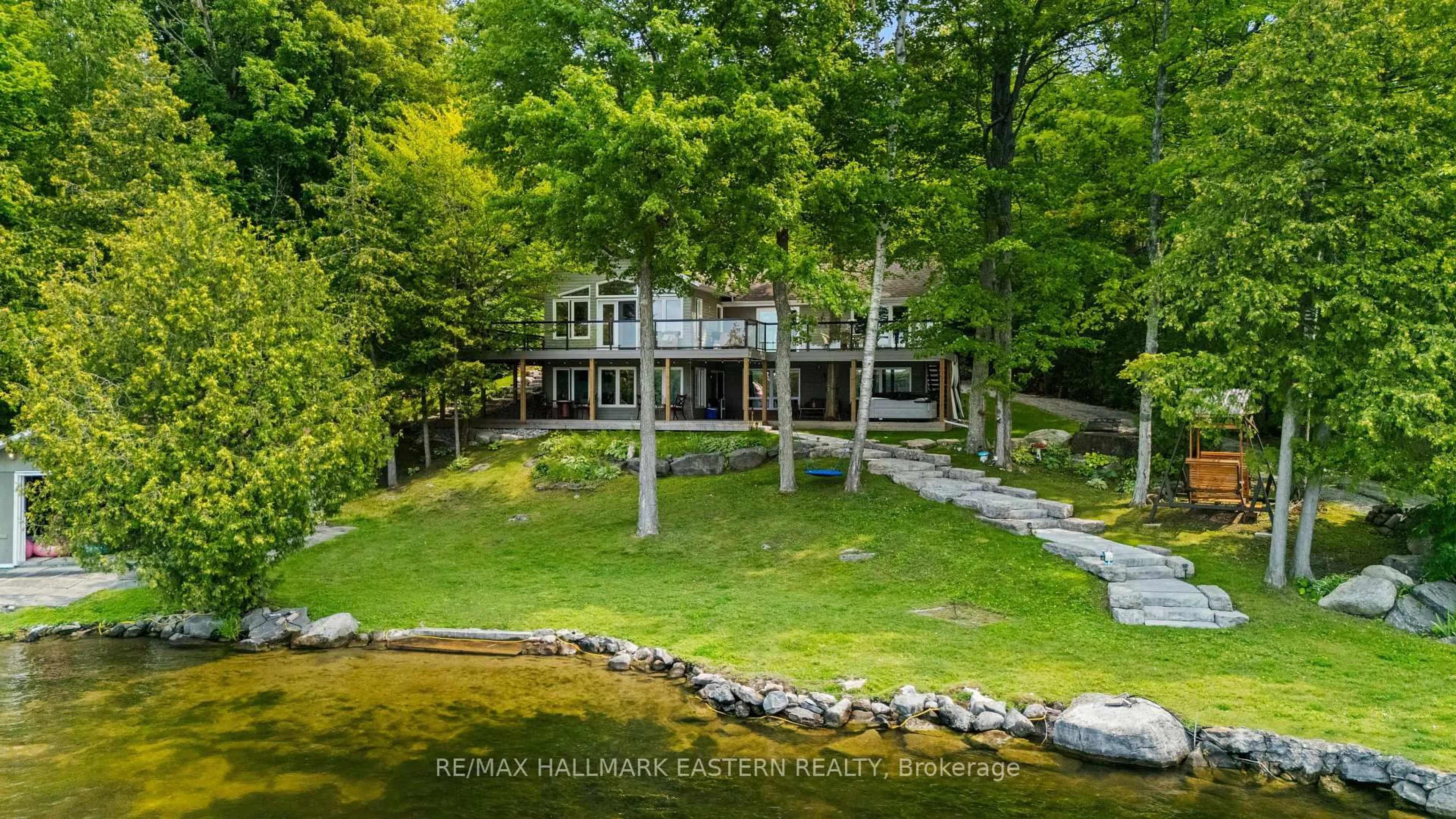 A pic from outside/outdoor area/front of a property/back of a property/a pic from drone, water/lake/river/ocean view for 28 Maplewood Crt, Trent Lakes Ontario K9J 6X2