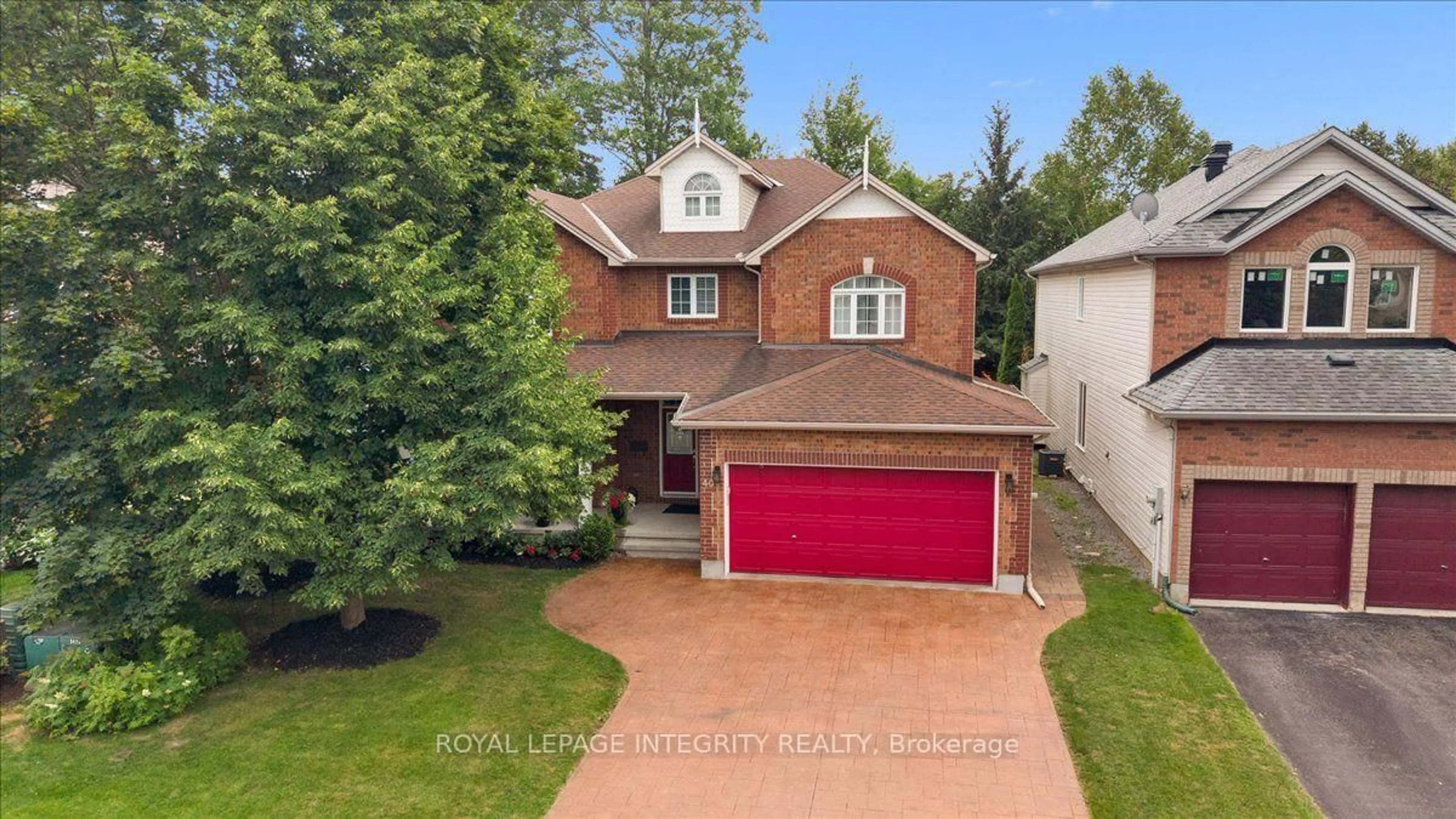 A pic from outside/outdoor area/front of a property/back of a property/a pic from drone, street for 40 Bon Echo Cres, Kanata Ontario K2M 2W6