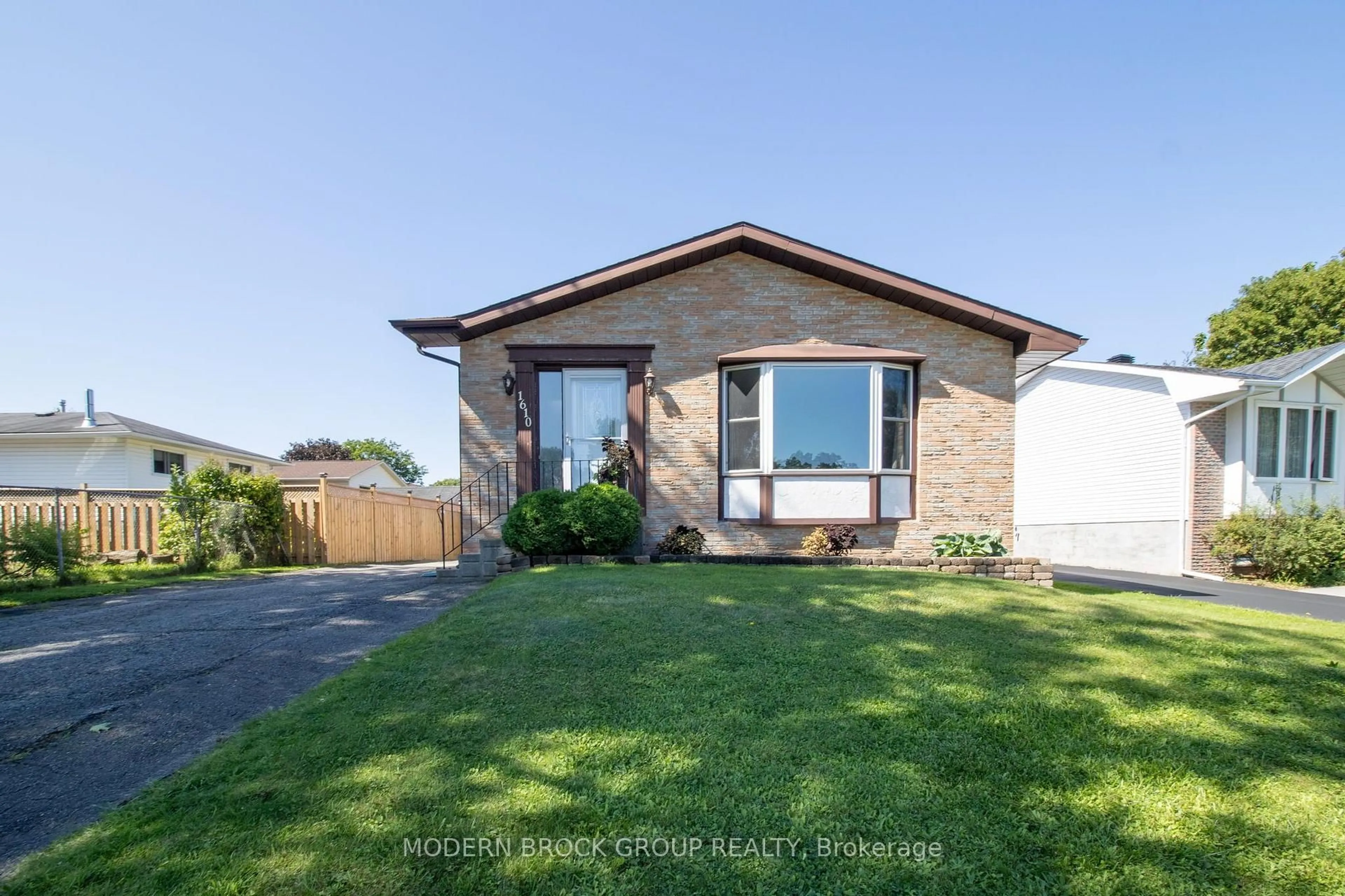 Home with brick exterior material, street for 1610 Kensington Pkwy, Brockville Ontario K6V 6J2
