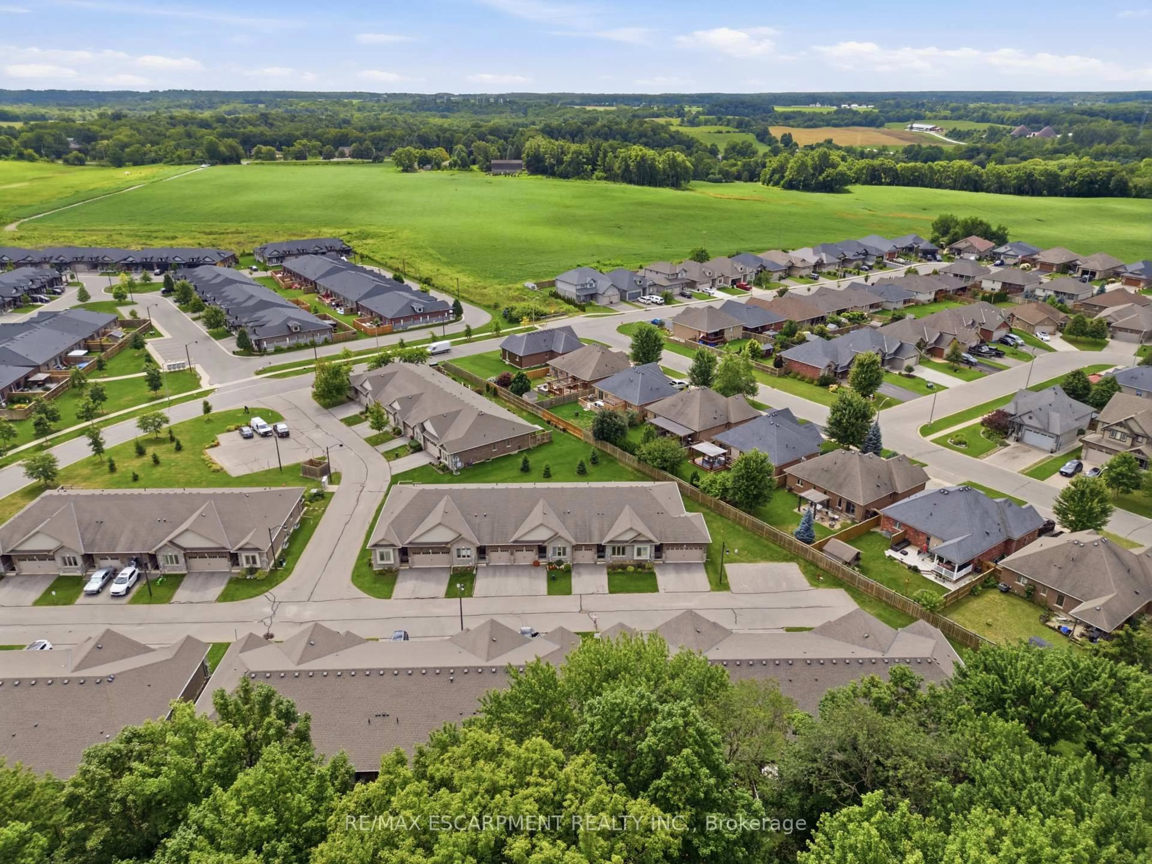 A pic from outside/outdoor area/front of a property/back of a property/a pic from drone, street for 194 Donly Dr #14, Norfolk Ontario N3Y 0C6