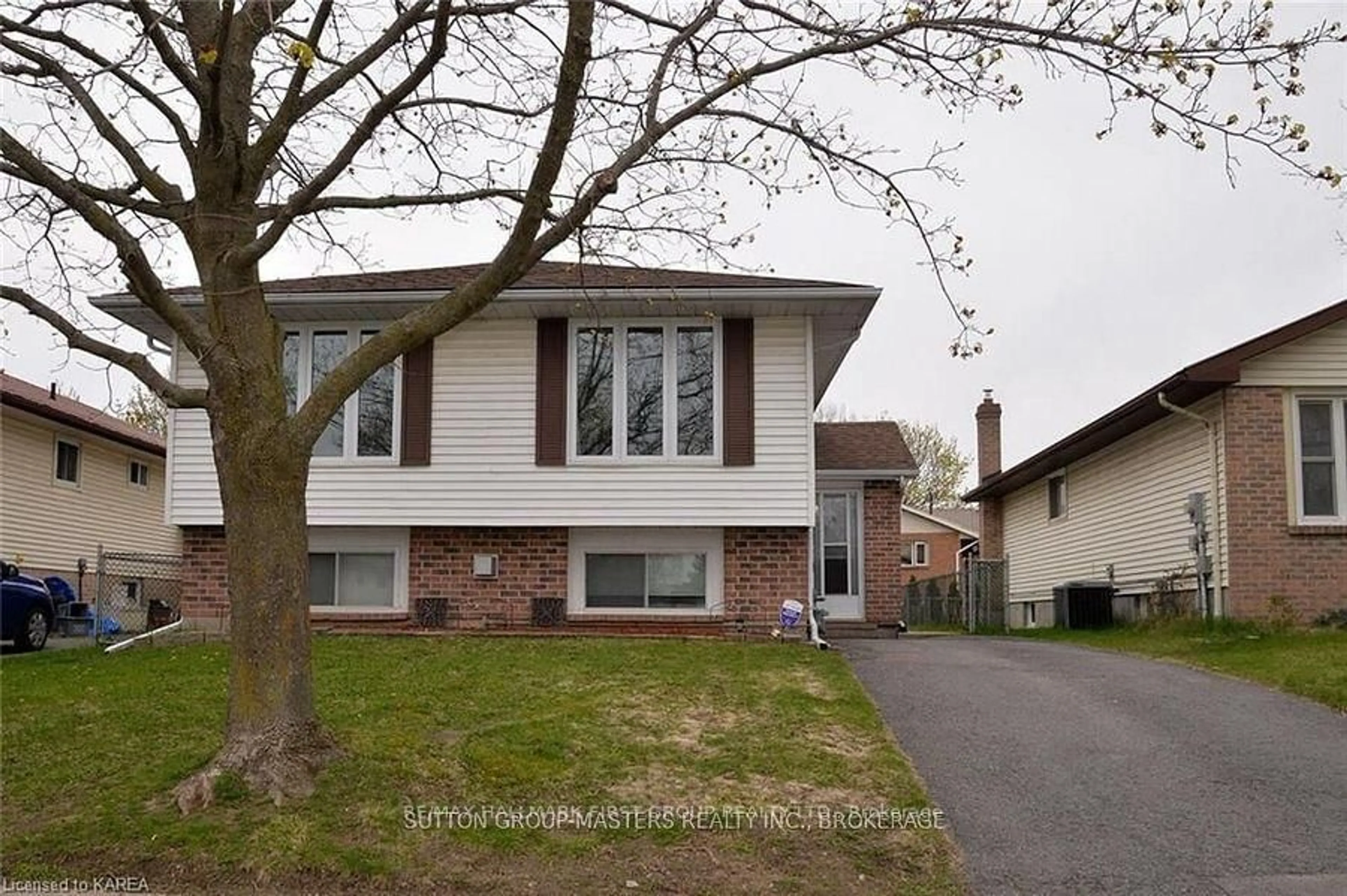 Home with vinyl exterior material, street for 27 Dauphin Ave, Kingston Ontario K7K 6B2