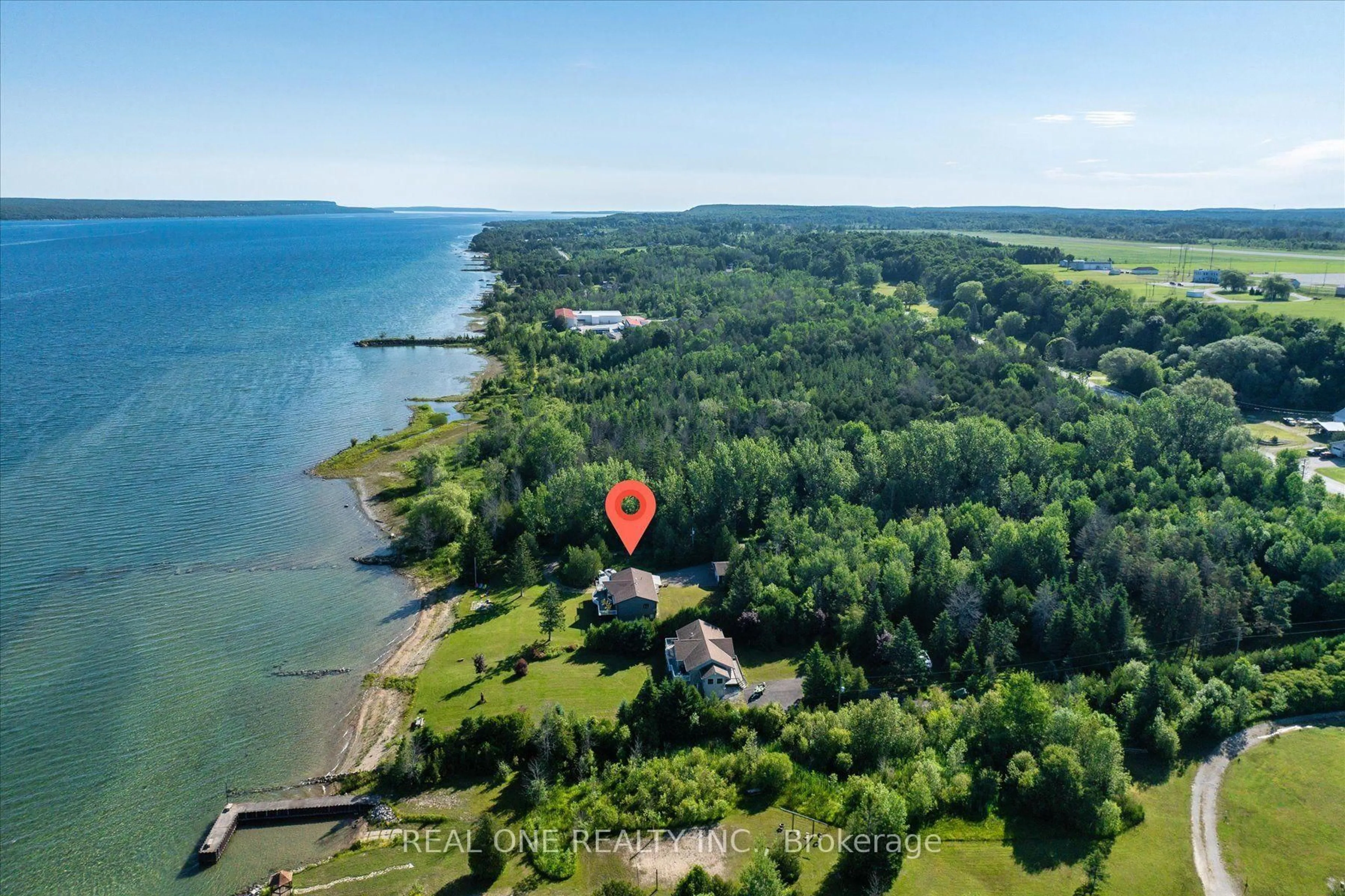 A pic from outside/outdoor area/front of a property/back of a property/a pic from drone, water/lake/river/ocean view for 501219 Grey Road 1 Rd, Georgian Bluffs Ontario N0H 2T0