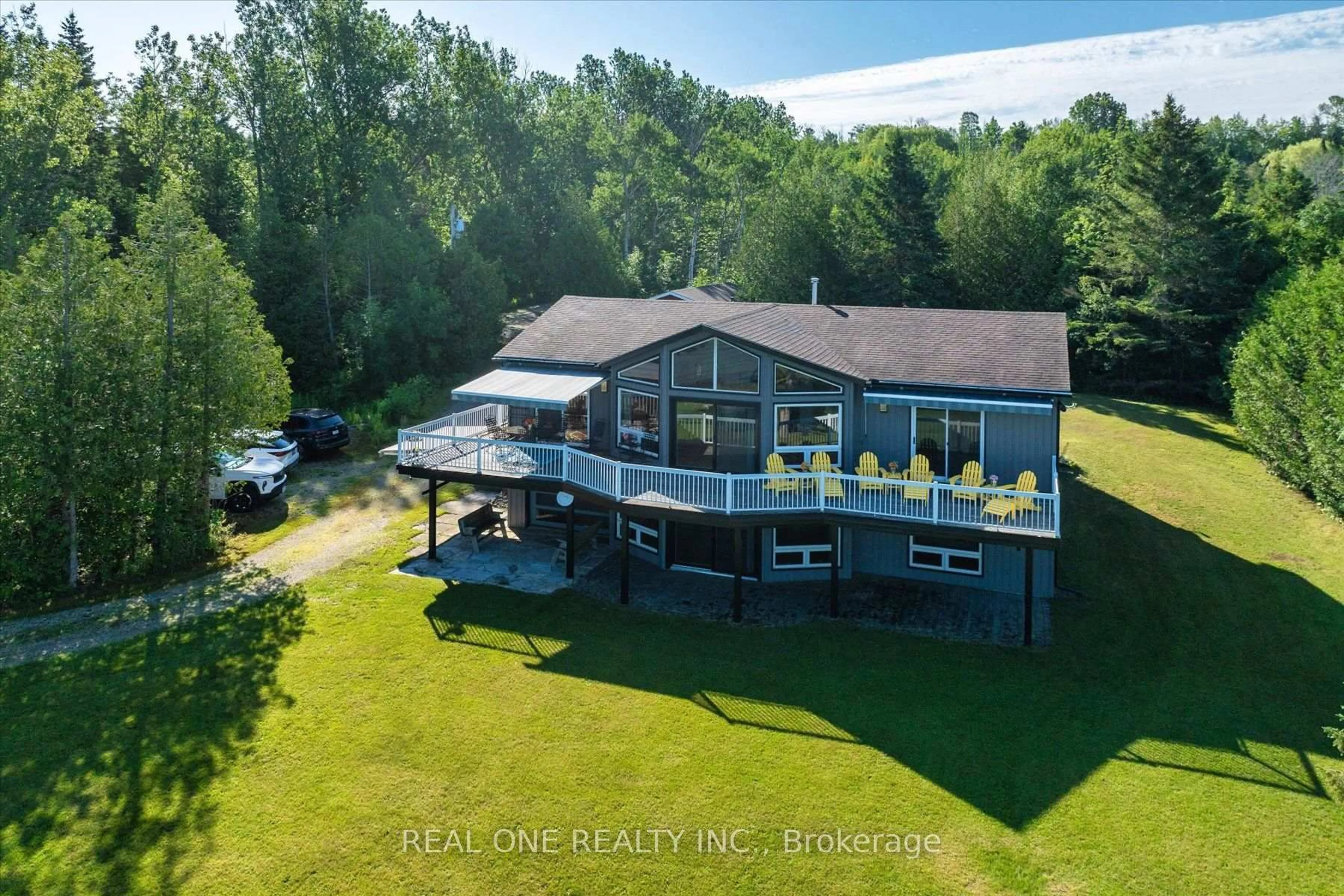 A pic from outside/outdoor area/front of a property/back of a property/a pic from drone, water/lake/river/ocean view for 501219 Grey Road 1 Rd, Georgian Bluffs Ontario N0H 2T0