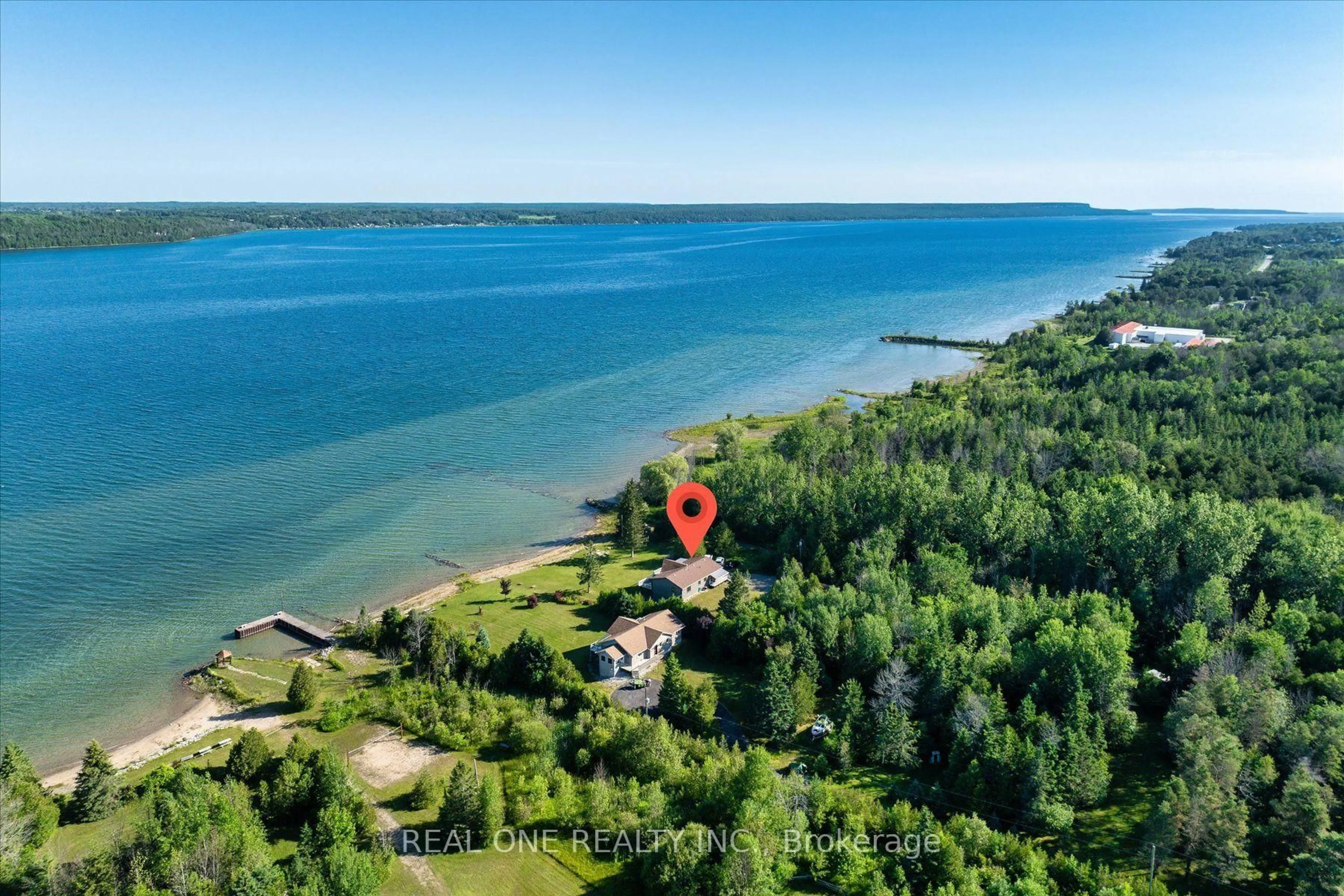 A pic from outside/outdoor area/front of a property/back of a property/a pic from drone, water/lake/river/ocean view for 501219 Grey Road 1 Rd, Georgian Bluffs Ontario N0H 2T0