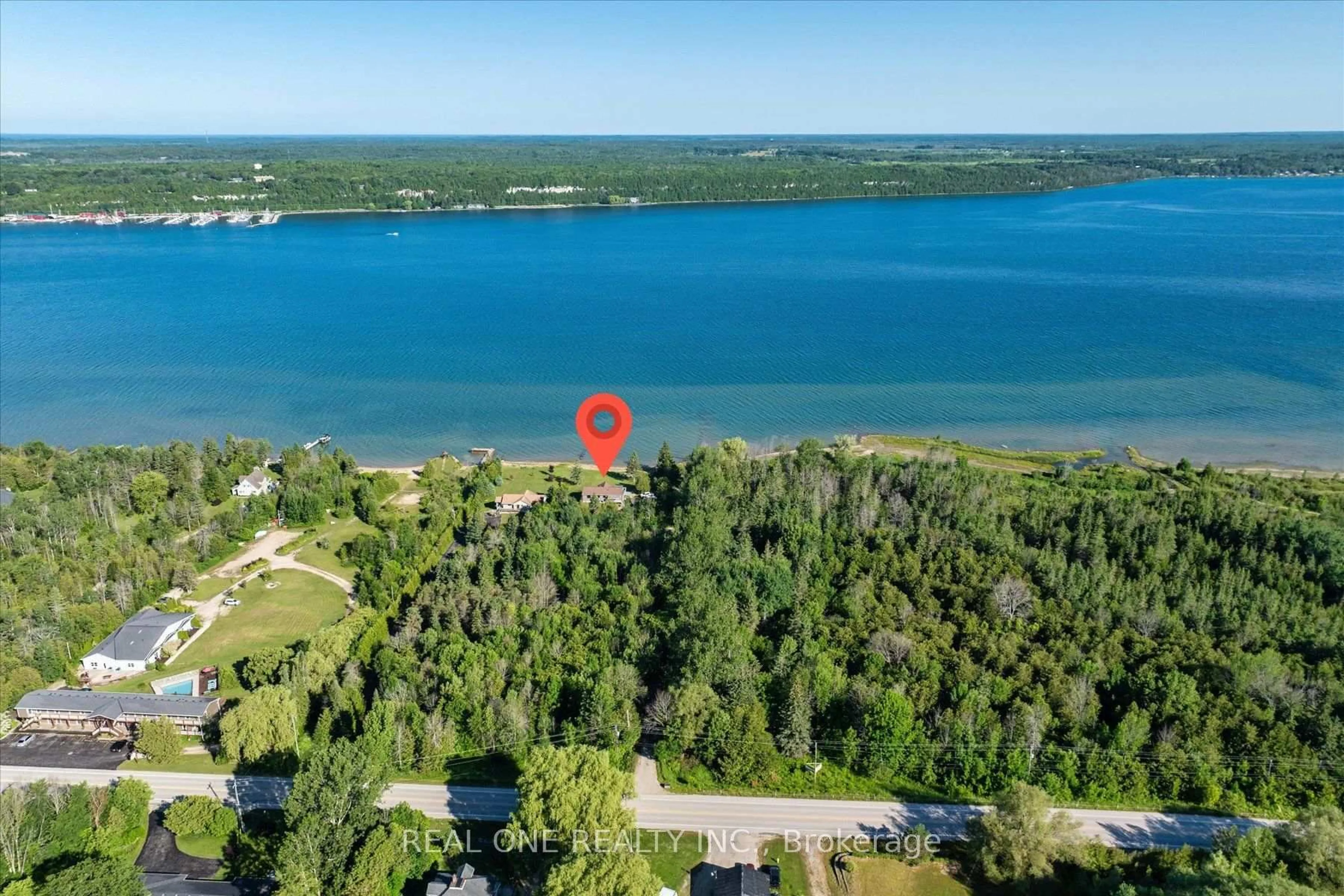A pic from outside/outdoor area/front of a property/back of a property/a pic from drone, water/lake/river/ocean view for 501219 Grey Road 1 Rd, Georgian Bluffs Ontario N0H 2T0