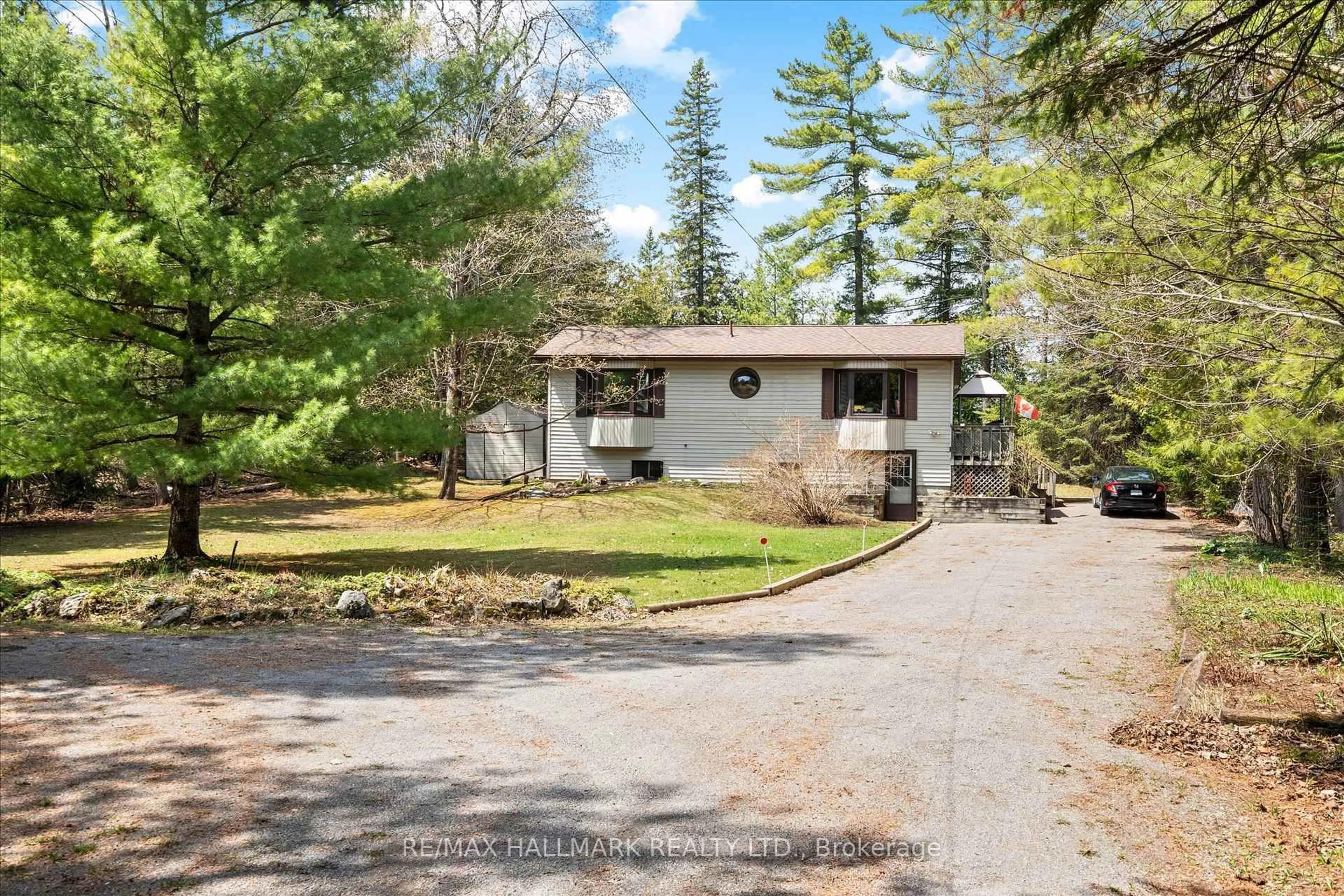 A pic from outside/outdoor area/front of a property/back of a property/a pic from drone, unknown for 25 Little Silver Lake Way, Trent Lakes Ontario K0M 1A0