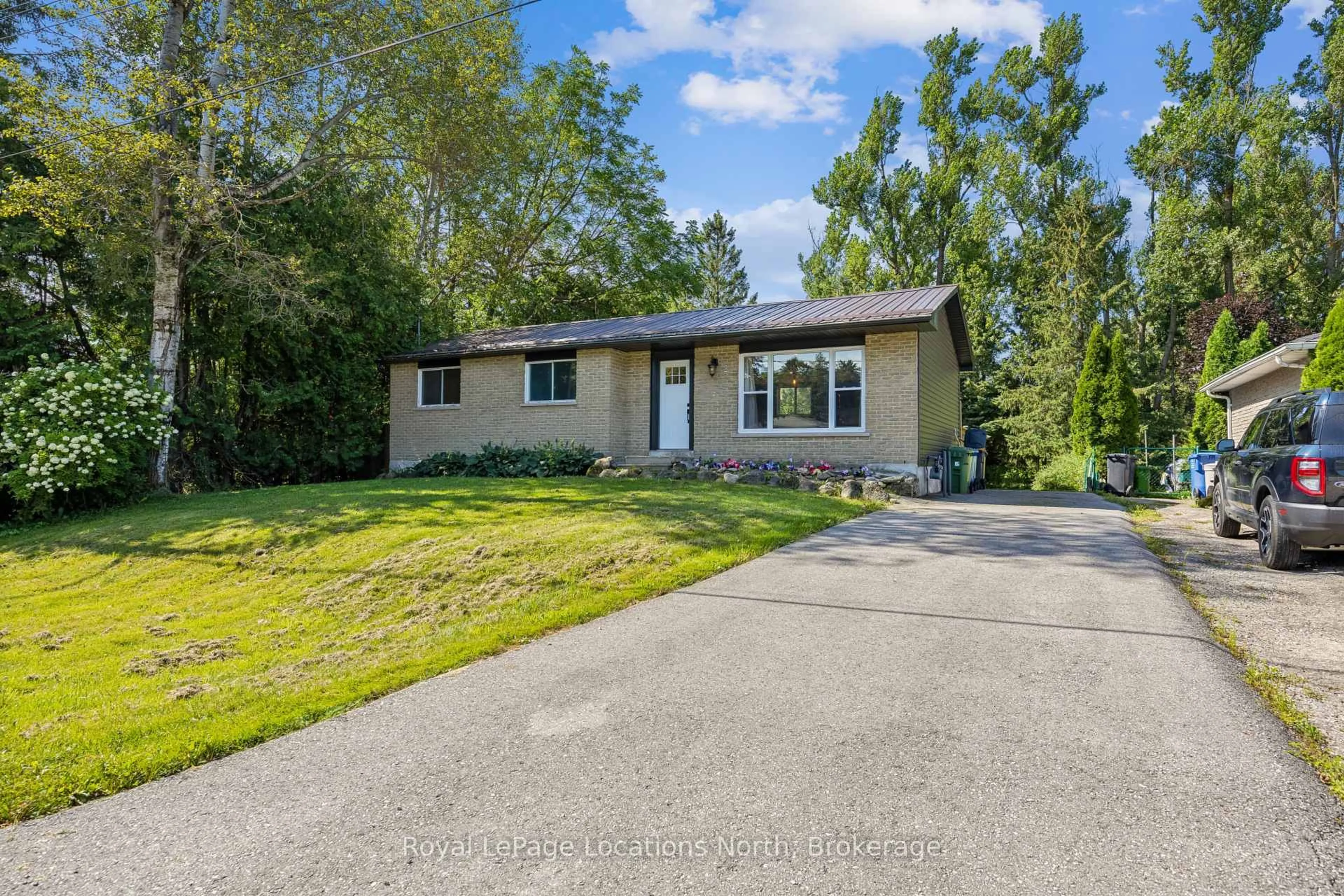 Home with vinyl exterior material, street for 2 MCDOWELL St, Southgate Ontario N0C 1B0