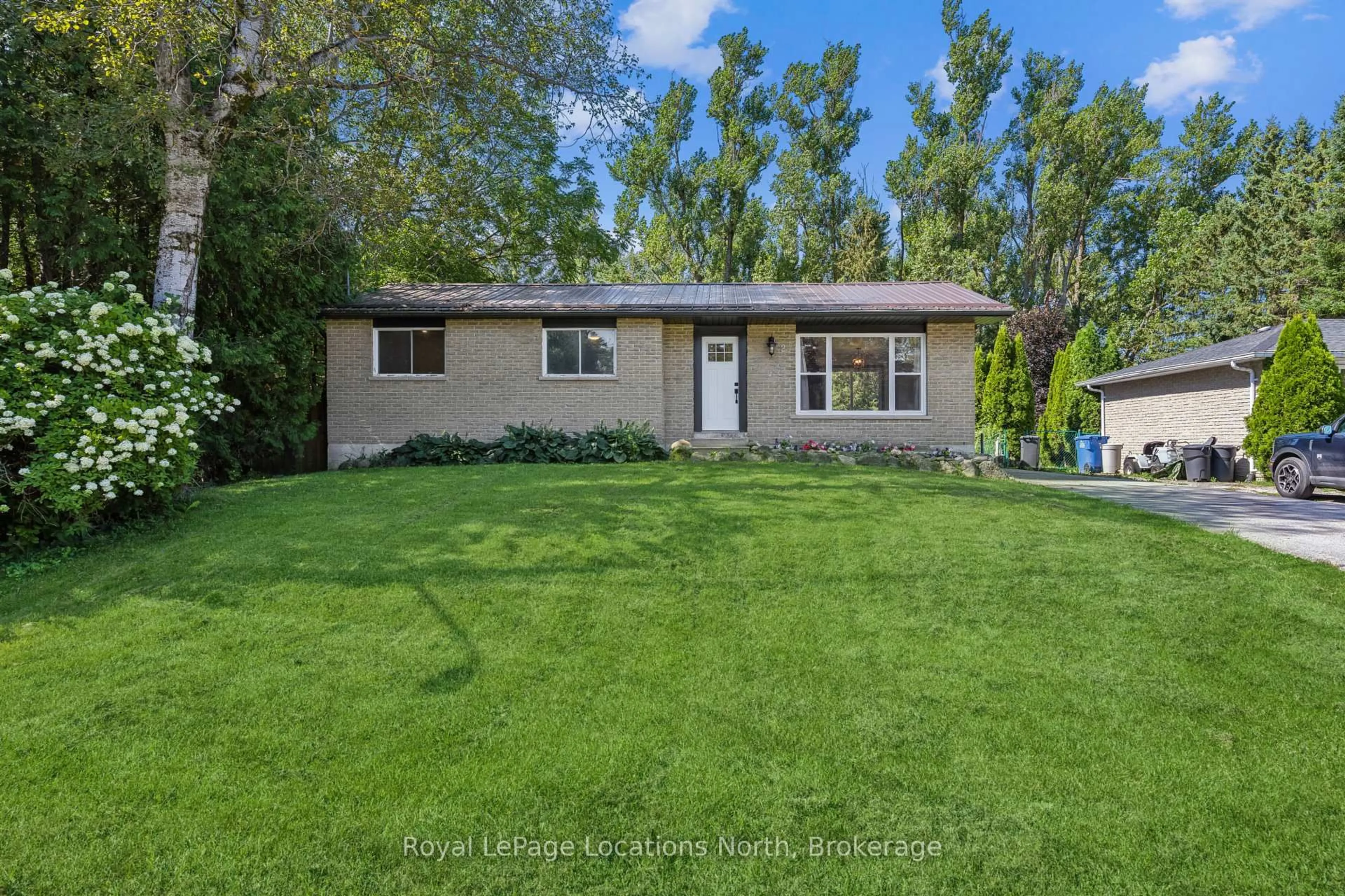 Home with vinyl exterior material, street for 2 MCDOWELL St, Southgate Ontario N0C 1B0