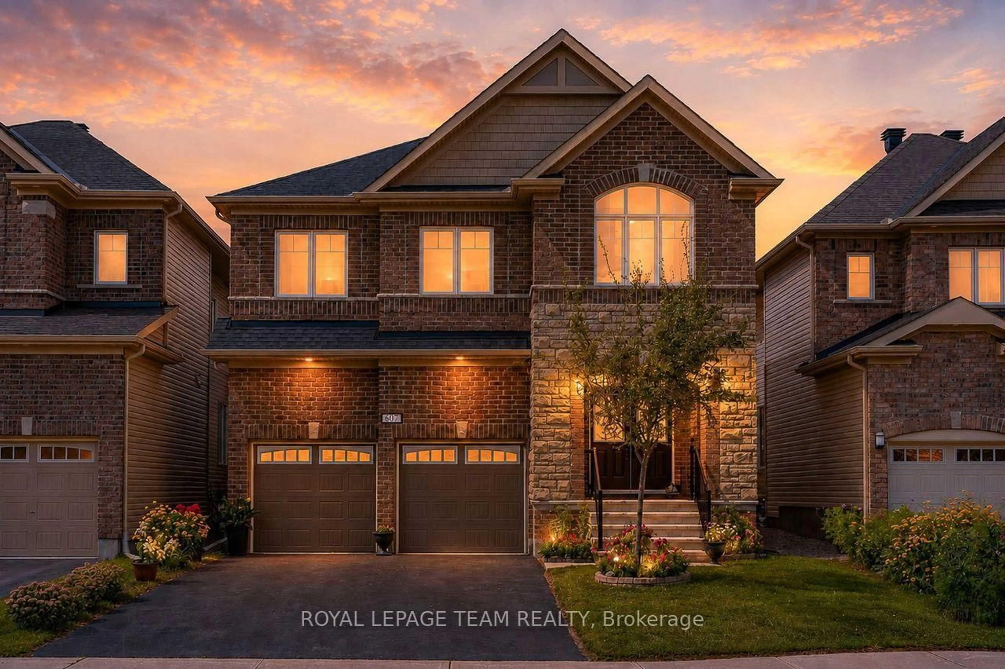 Home with brick exterior material, street for 607 Parade Dr, Stittsville Ontario K2S 0Y5