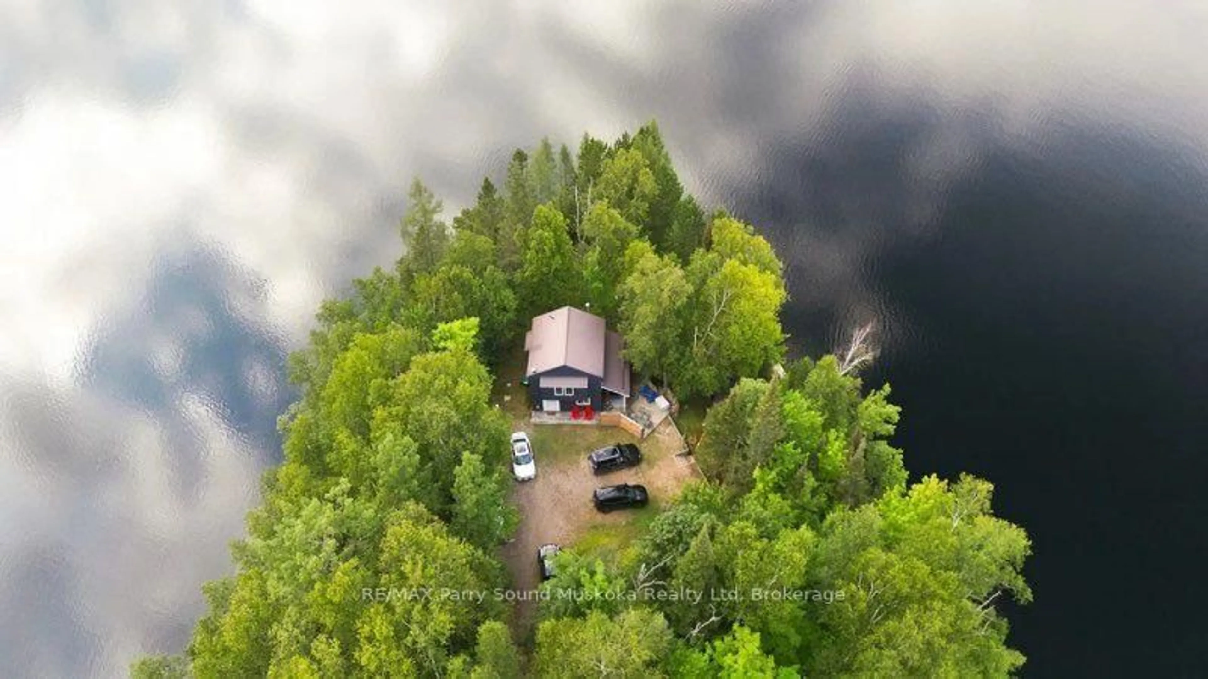 A pic from outside/outdoor area/front of a property/back of a property/a pic from drone, forest/trees view for 569 Ralph Rd, Parry Sound Remote Area Ontario P0H 2L0