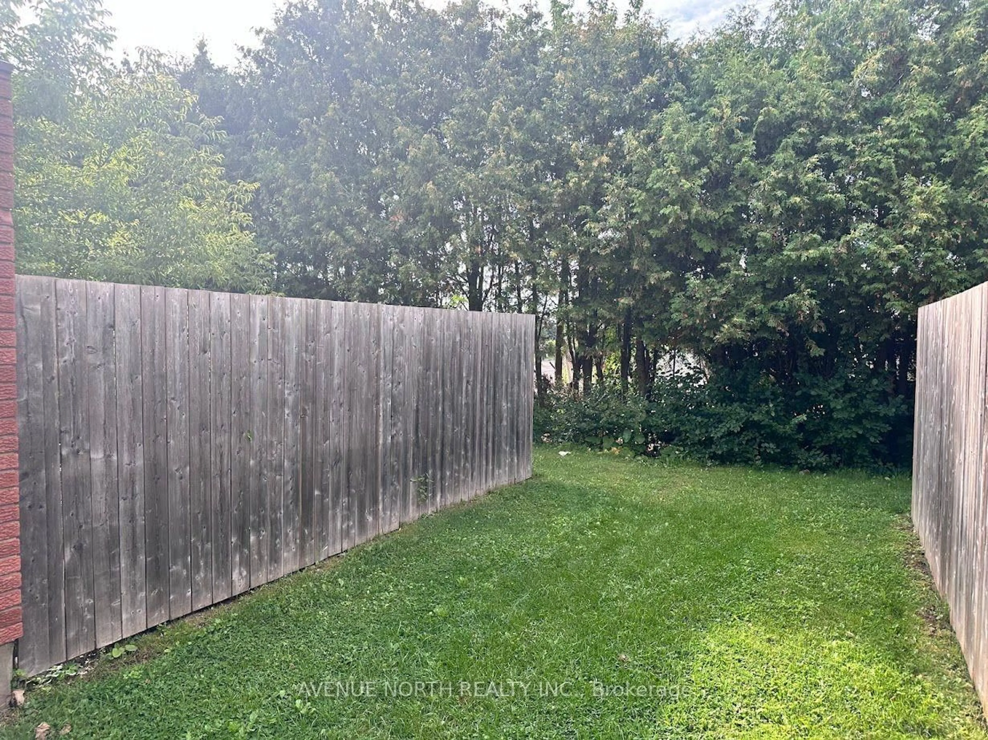 A pic from outside/outdoor area/front of a property/back of a property/a pic from drone, forest/trees view for 1352 Foxwell St, Ottawa Ontario K1B 5J2