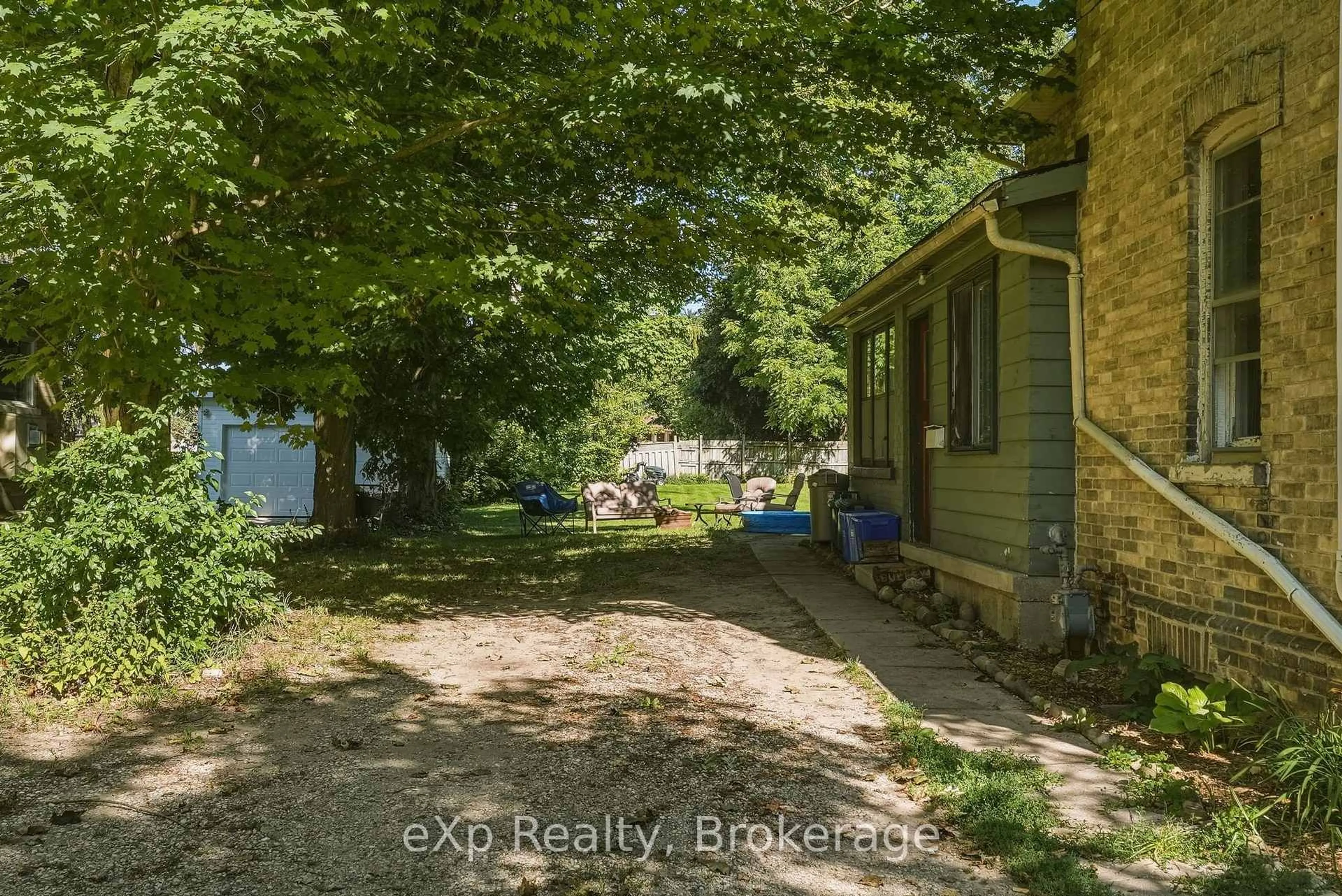 A pic from outside/outdoor area/front of a property/back of a property/a pic from drone, street for 173 Birmingham St, Wellington North Ontario N0G 2L2