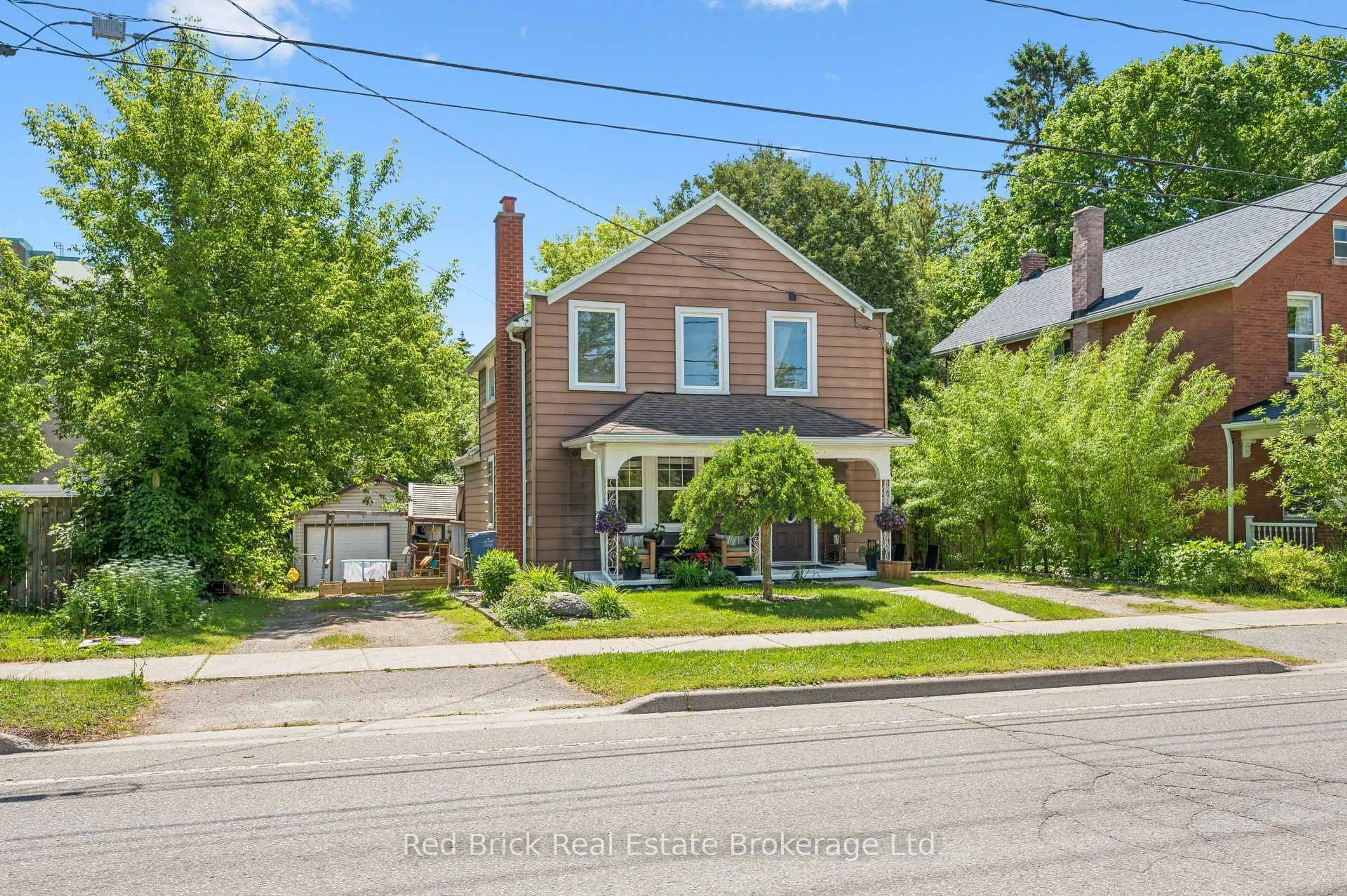 Home with brick exterior material, street for 324 Waterloo Ave, Guelph Ontario N1H 3J8