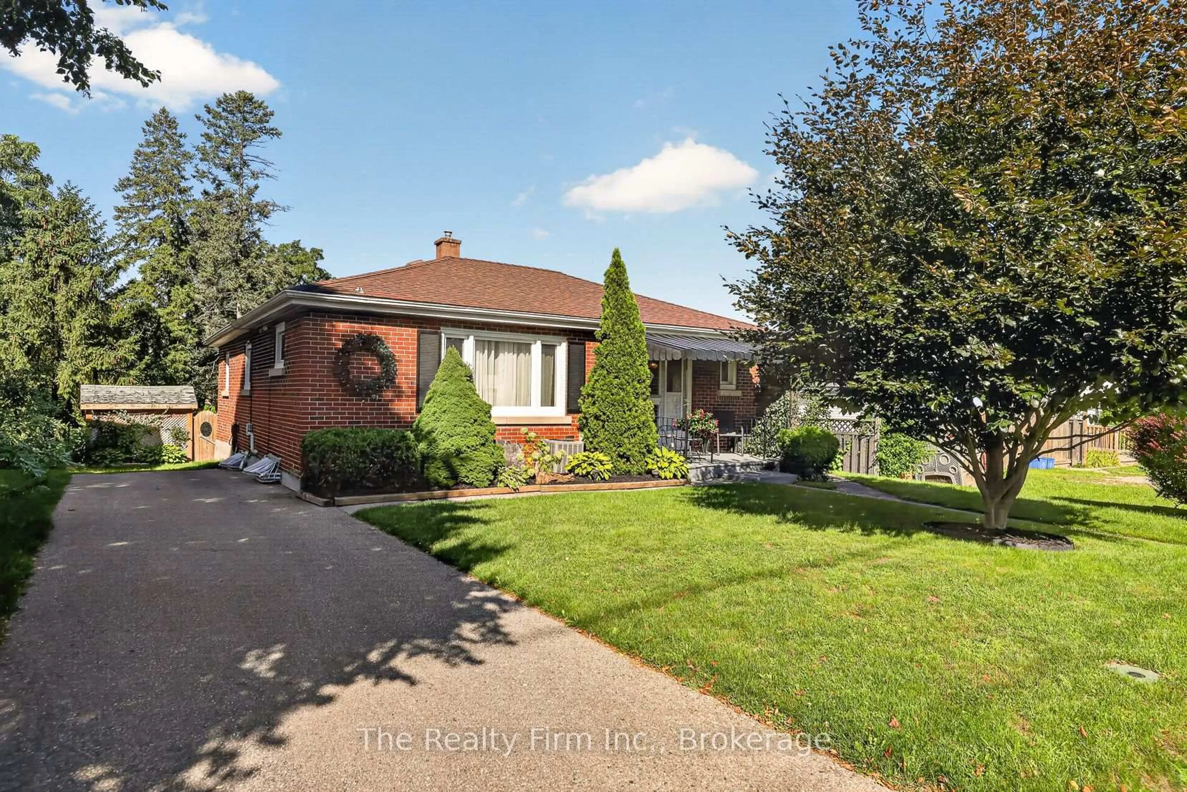 Home with brick exterior material, street for 14 East Park Dr, Woodstock Ontario N4S 3M8