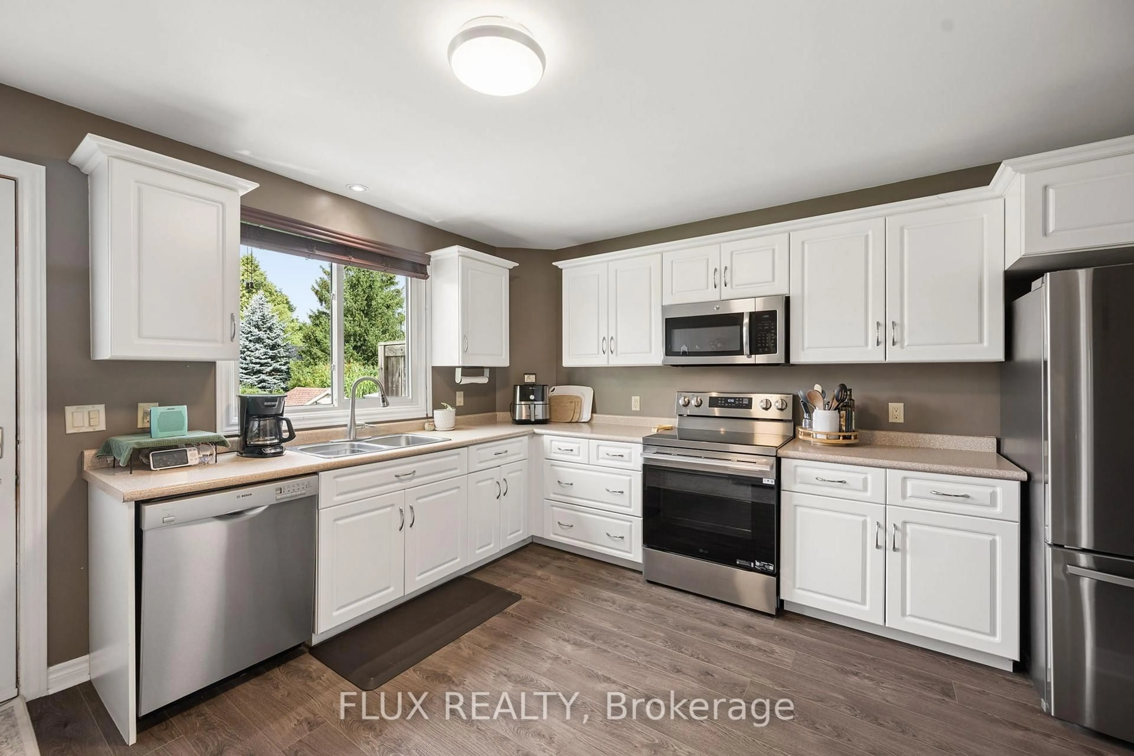 Open concept kitchen, ceramic/tile floor for 266 Dufferin St #9, Stratford Ontario N5A 2H2
