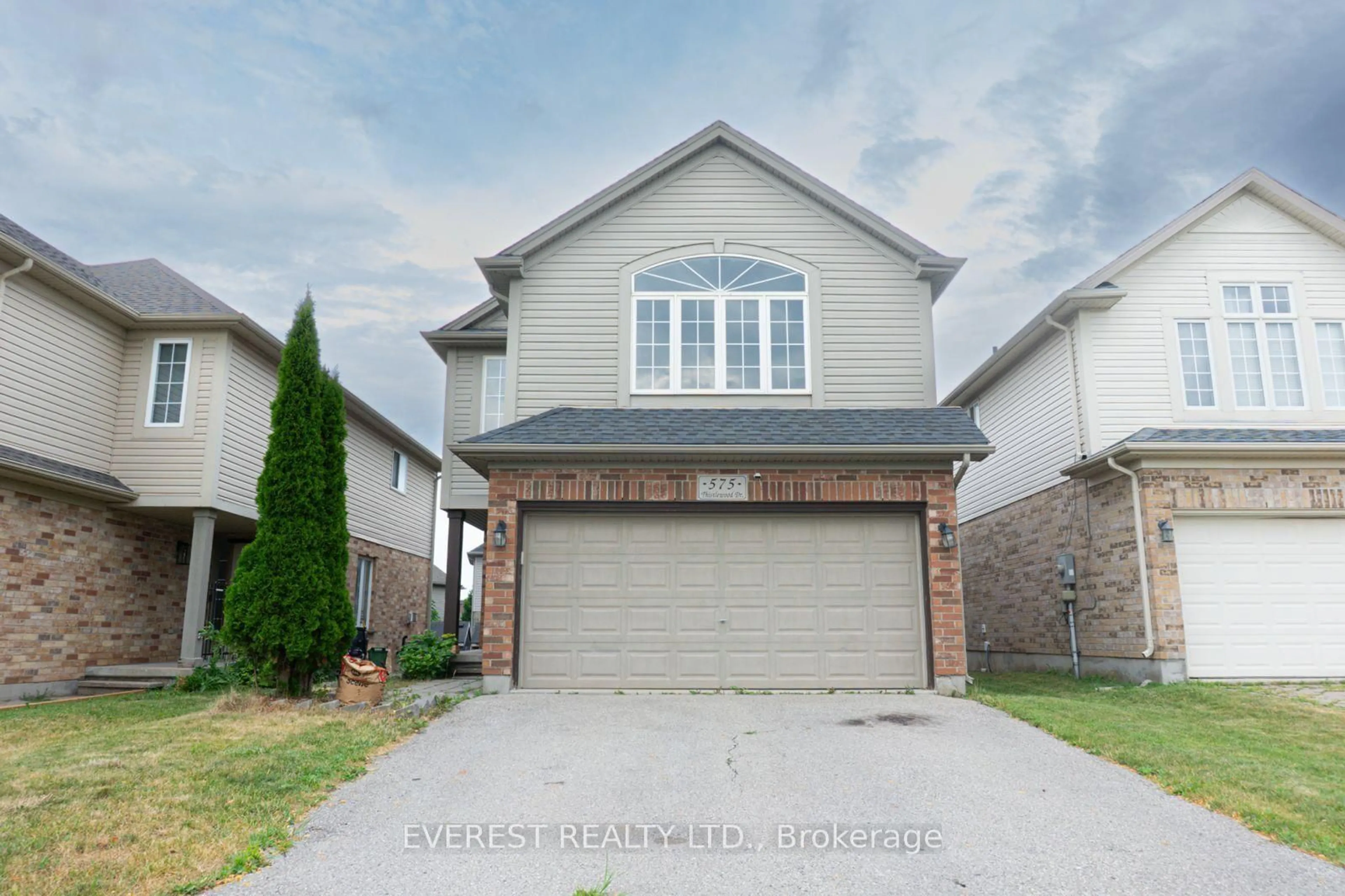 Home with vinyl exterior material, street for 575 Thistlewood Dr, London North Ontario N5X 4M1