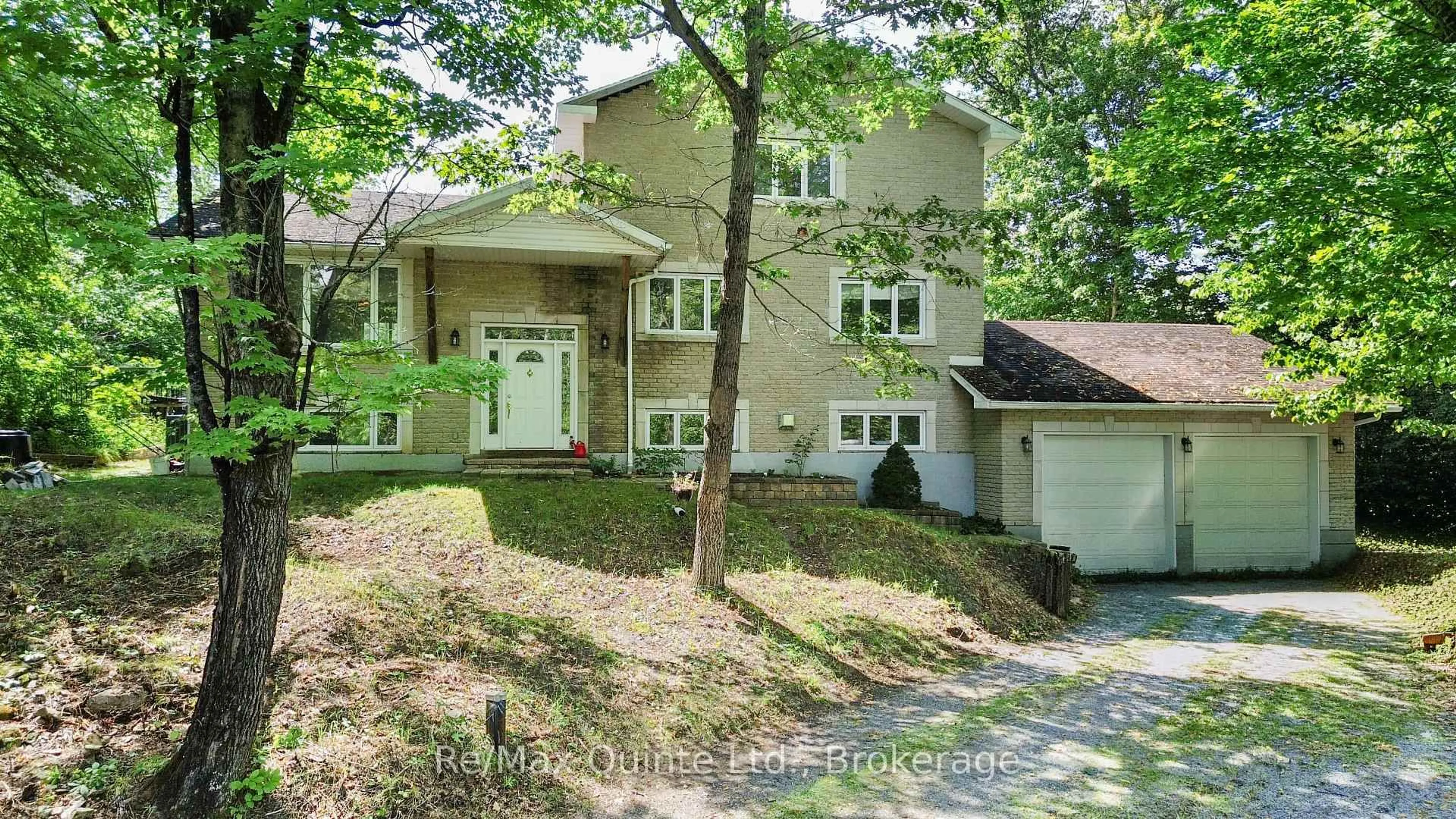 Home with brick exterior material, street for 49 North Shore Lane, Madoc Ontario K0K 2K0
