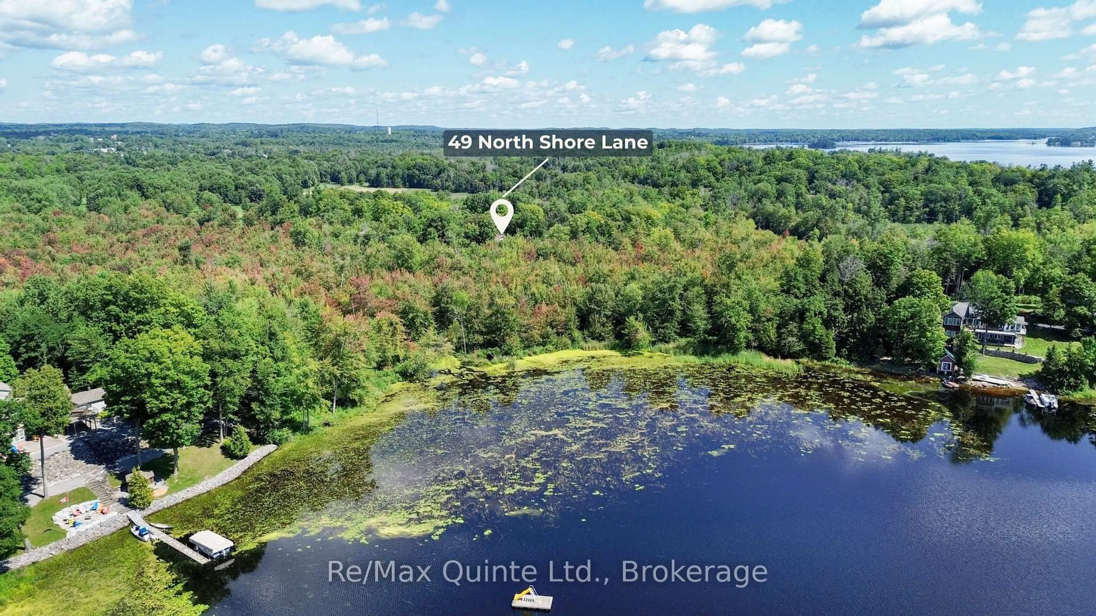 A pic from outside/outdoor area/front of a property/back of a property/a pic from drone, water/lake/river/ocean view for 49 North Shore Lane, Madoc Ontario K0K 2K0