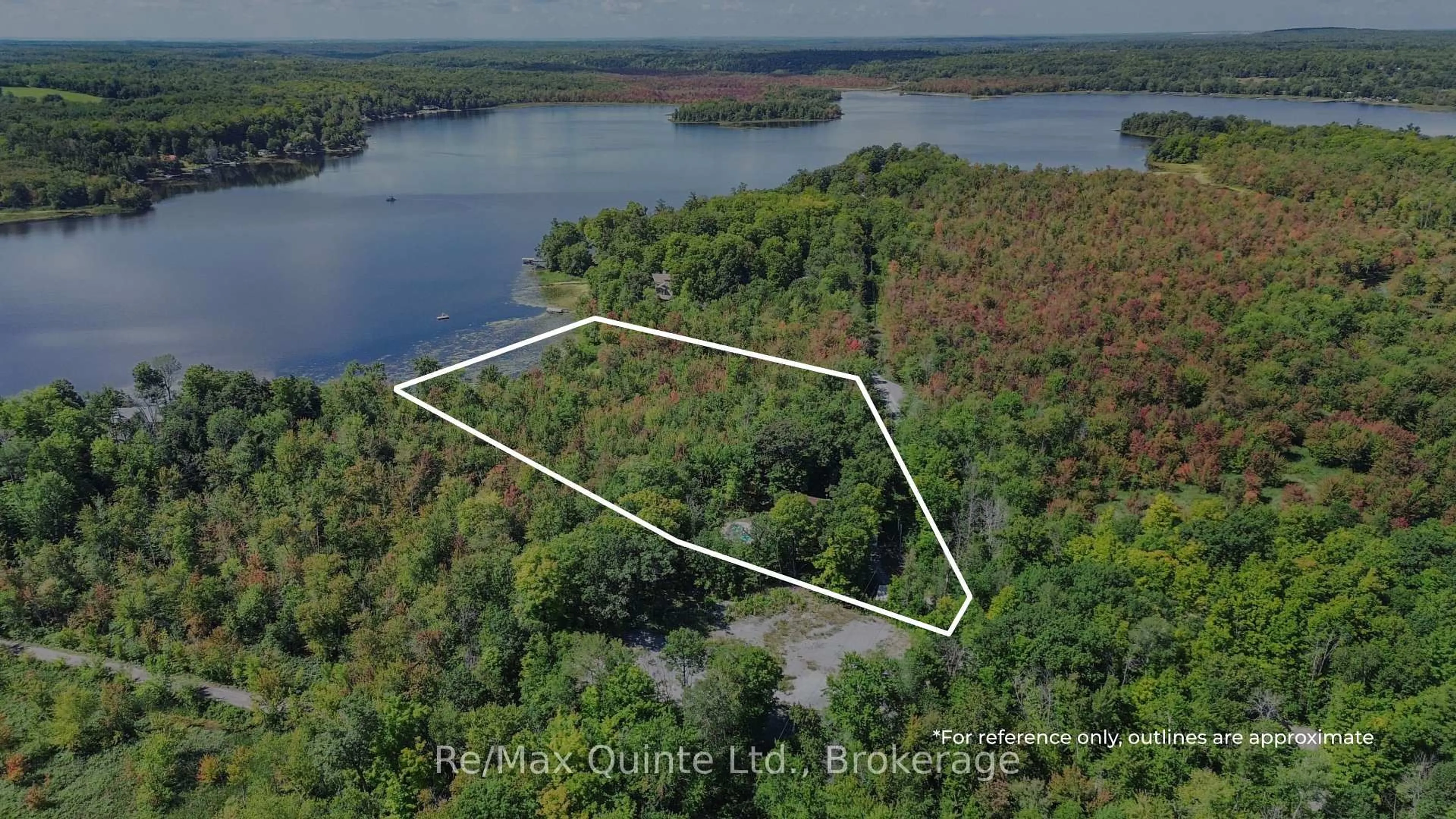 A pic from outside/outdoor area/front of a property/back of a property/a pic from drone, water/lake/river/ocean view for 49 North Shore Lane, Madoc Ontario K0K 2K0