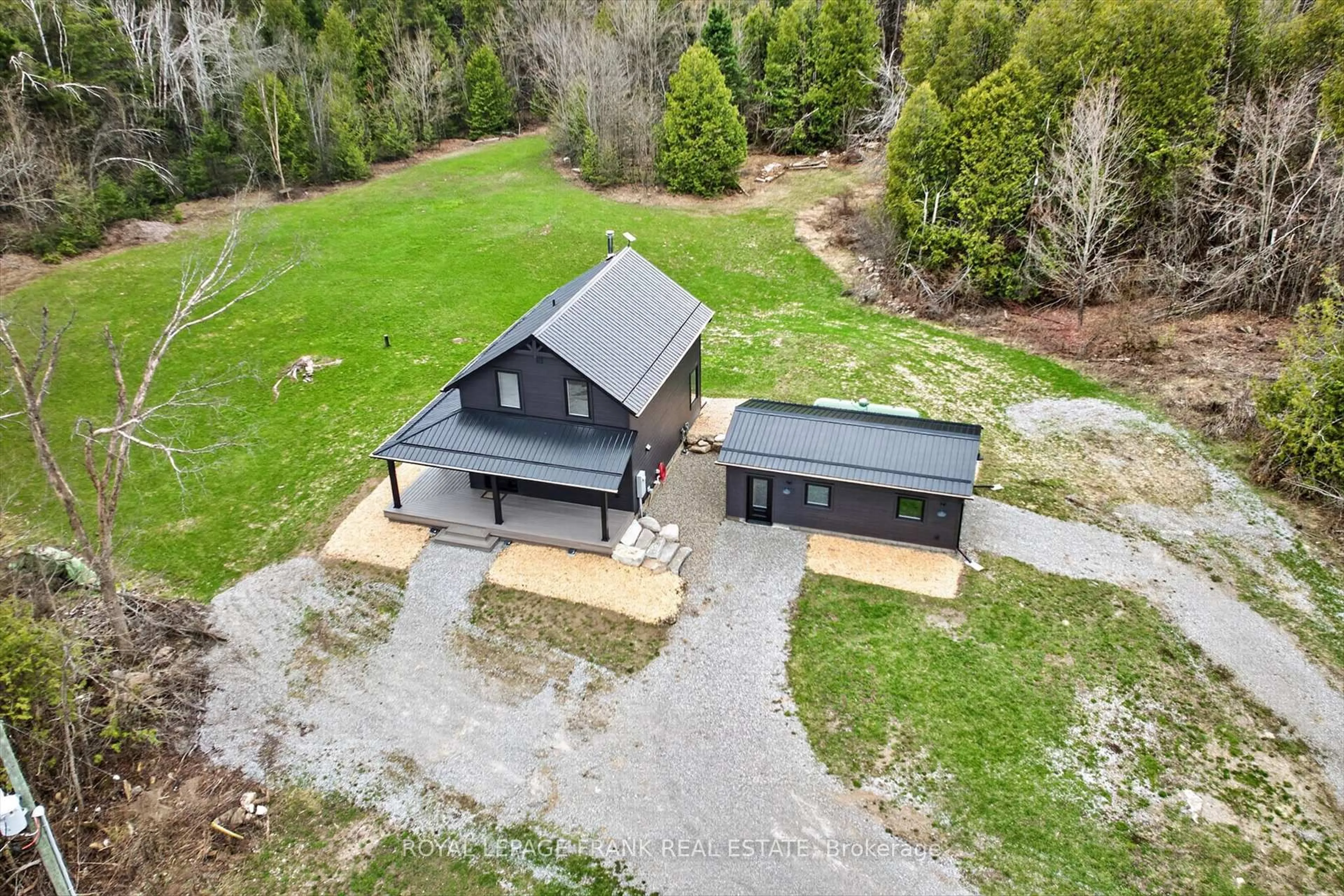 A pic from outside/outdoor area/front of a property/back of a property/a pic from drone, building for 165 County Rd 507, Trent Lakes Ontario K0L 1J0