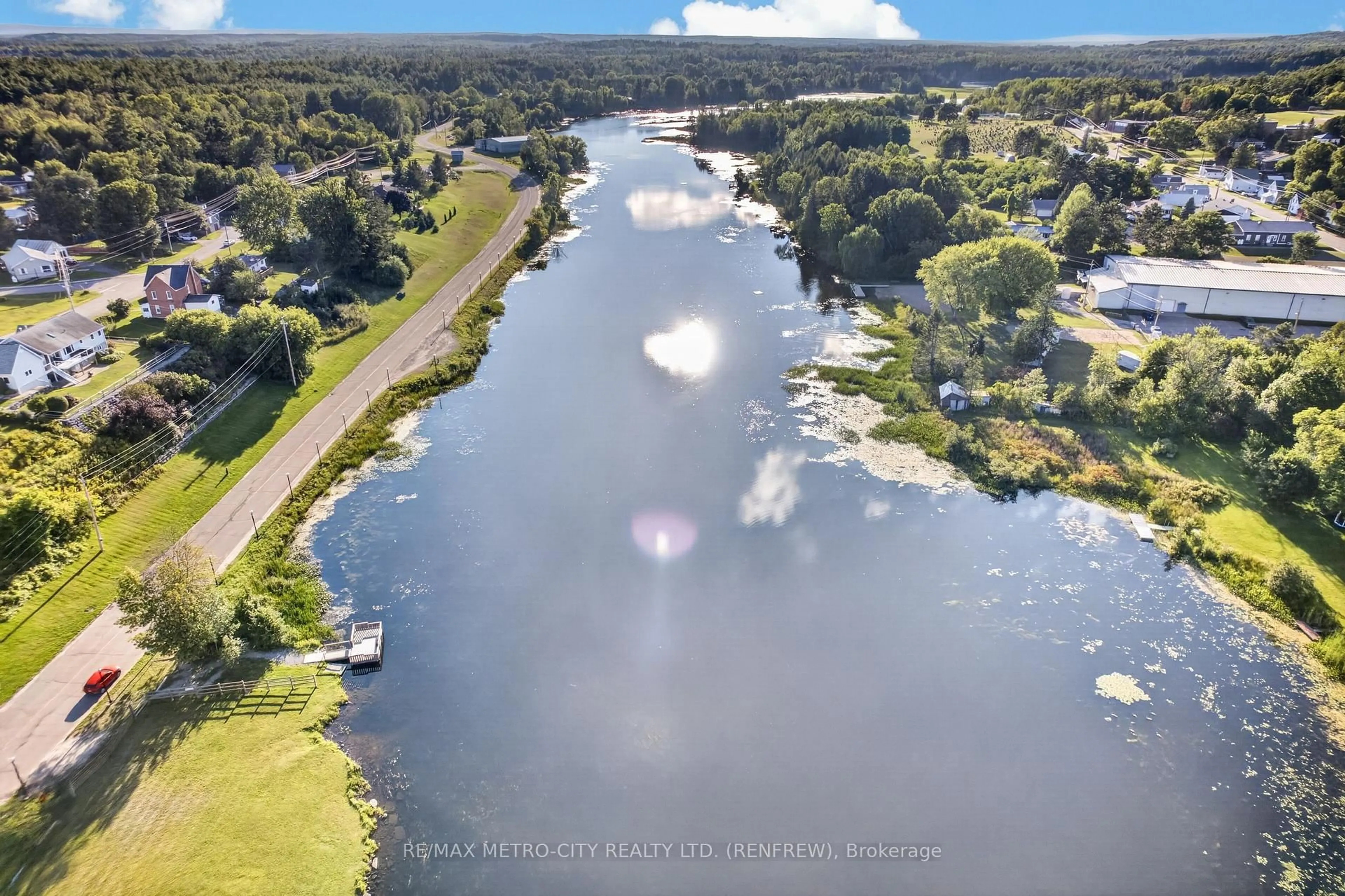 A pic from outside/outdoor area/front of a property/back of a property/a pic from drone, water/lake/river/ocean view for 293 Queen St, Eganville Ontario K0J 1T0