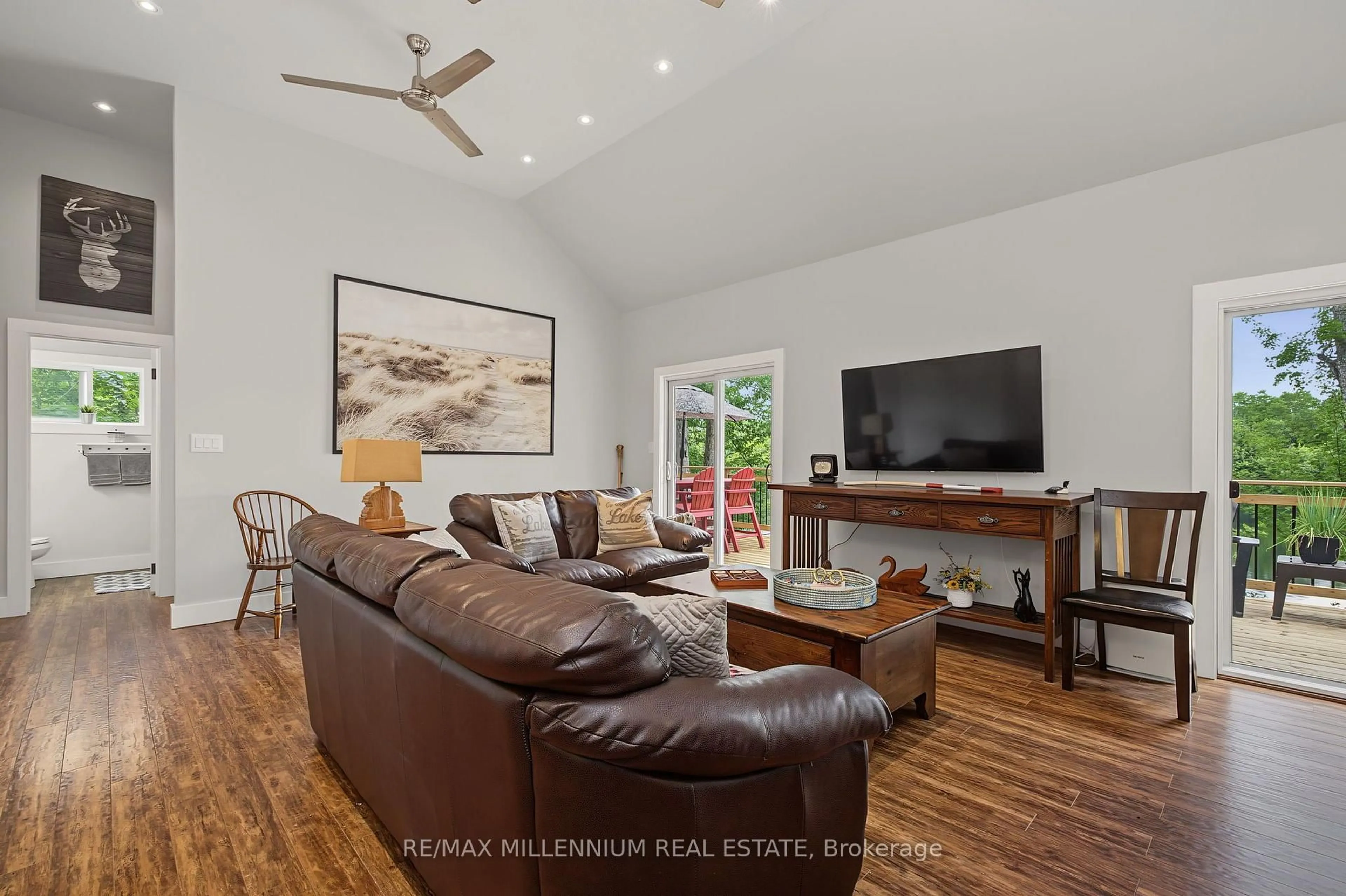 Living room with furniture, wood/laminate floor for 29 Yellow Birch Rd, Georgian Bay Ontario P0H 1C0