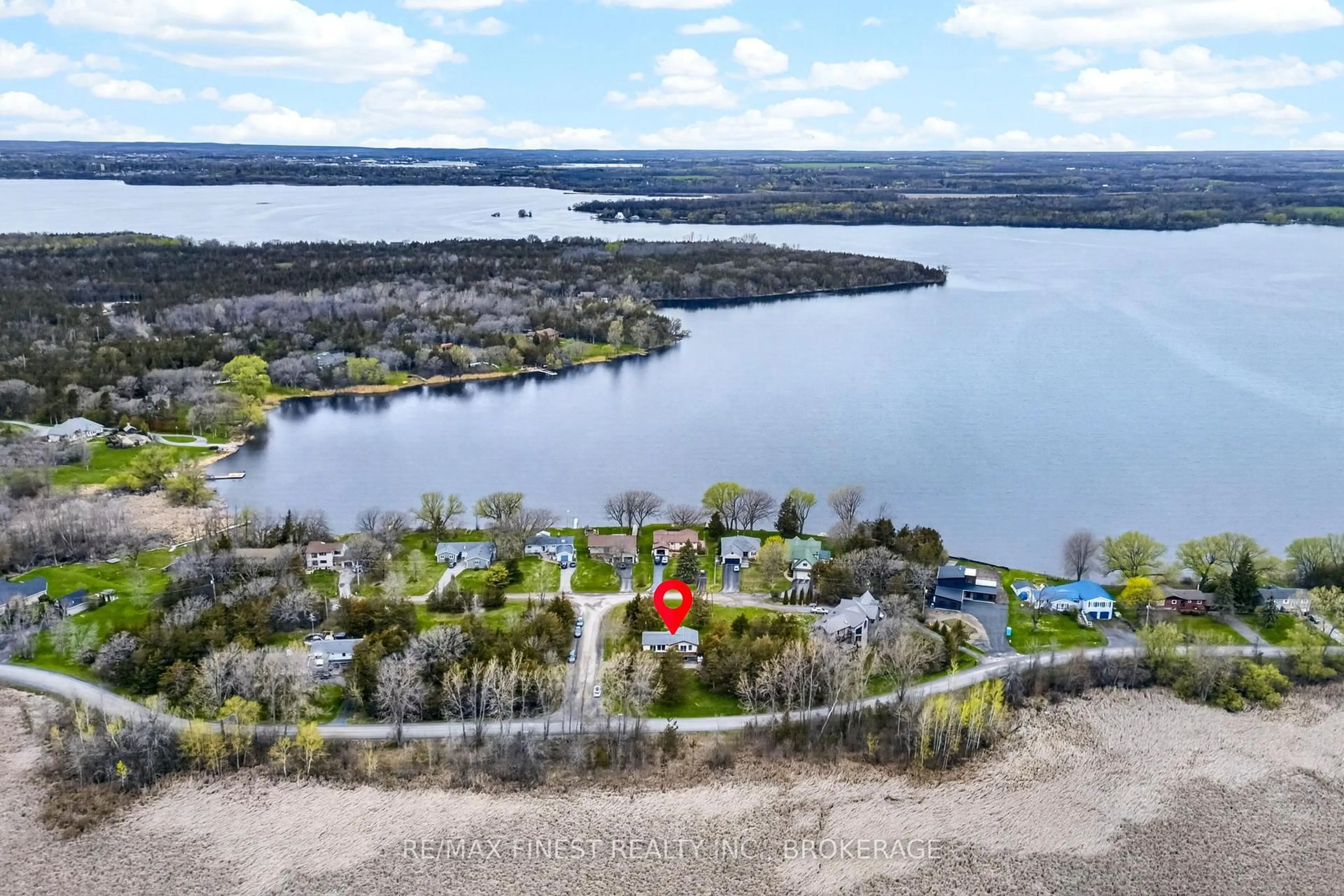 A pic from outside/outdoor area/front of a property/back of a property/a pic from drone, water/lake/river/ocean view for 8 Sunrise Crt, Prince Edward County Ontario K8N 4Z7