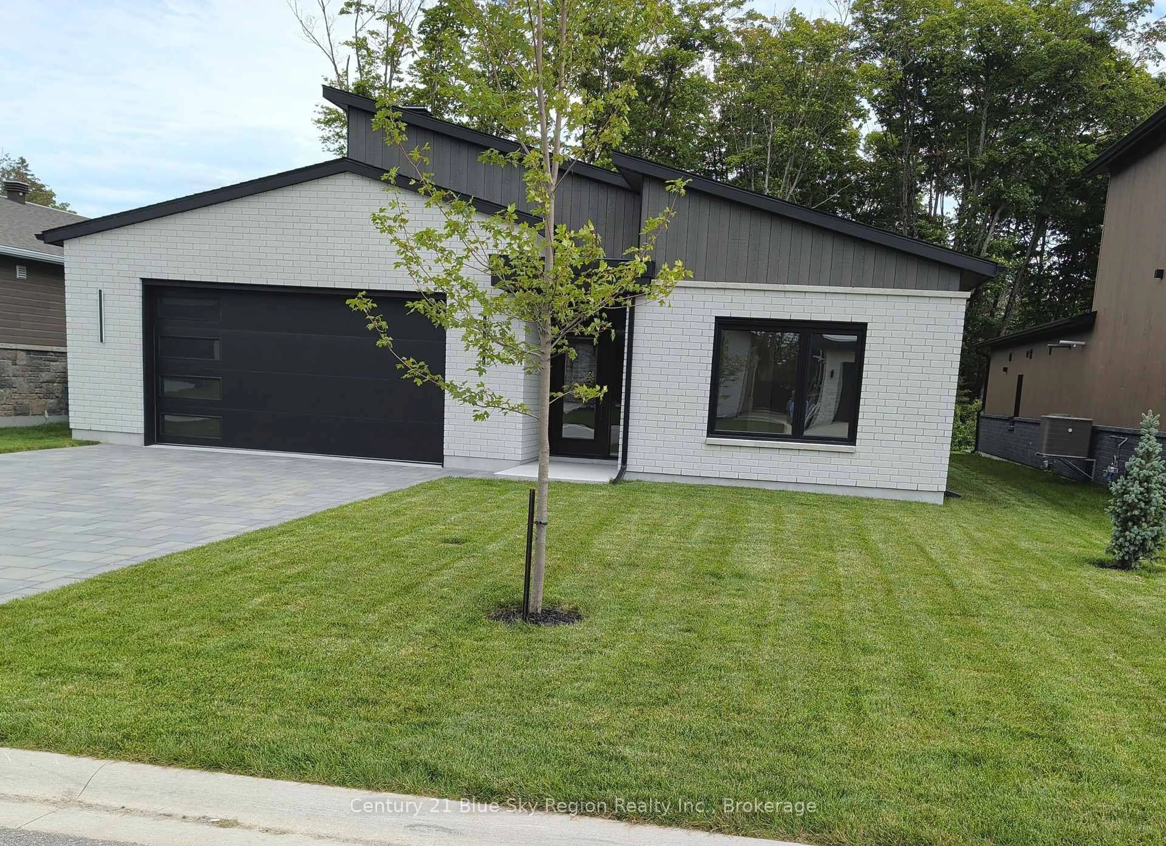 A pic from outside/outdoor area/front of a property/back of a property/a pic from drone, street for 38 Katie Ann Cres, North Bay Ontario P1C 1M8